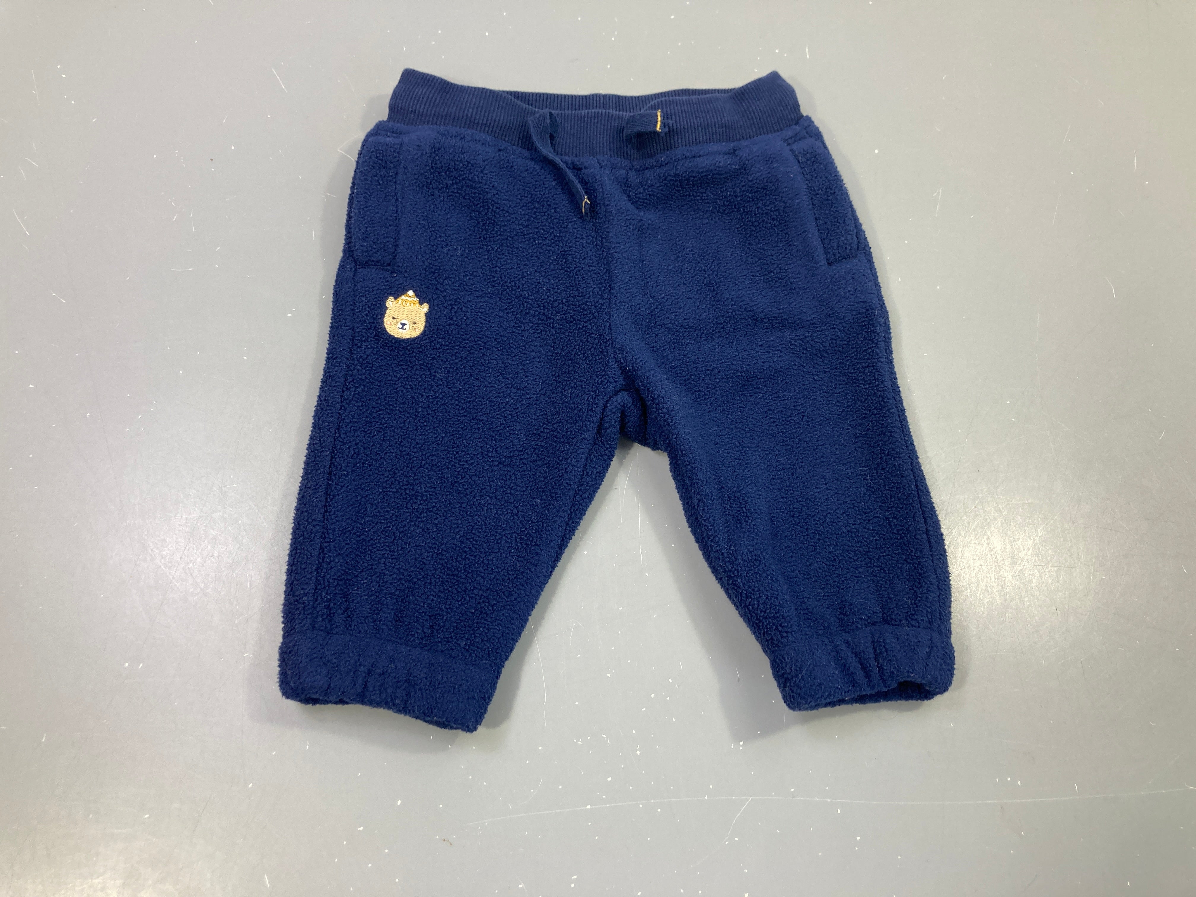 Pantalon polar bleu marine, tête d'ours, taille et chevilles élastiques