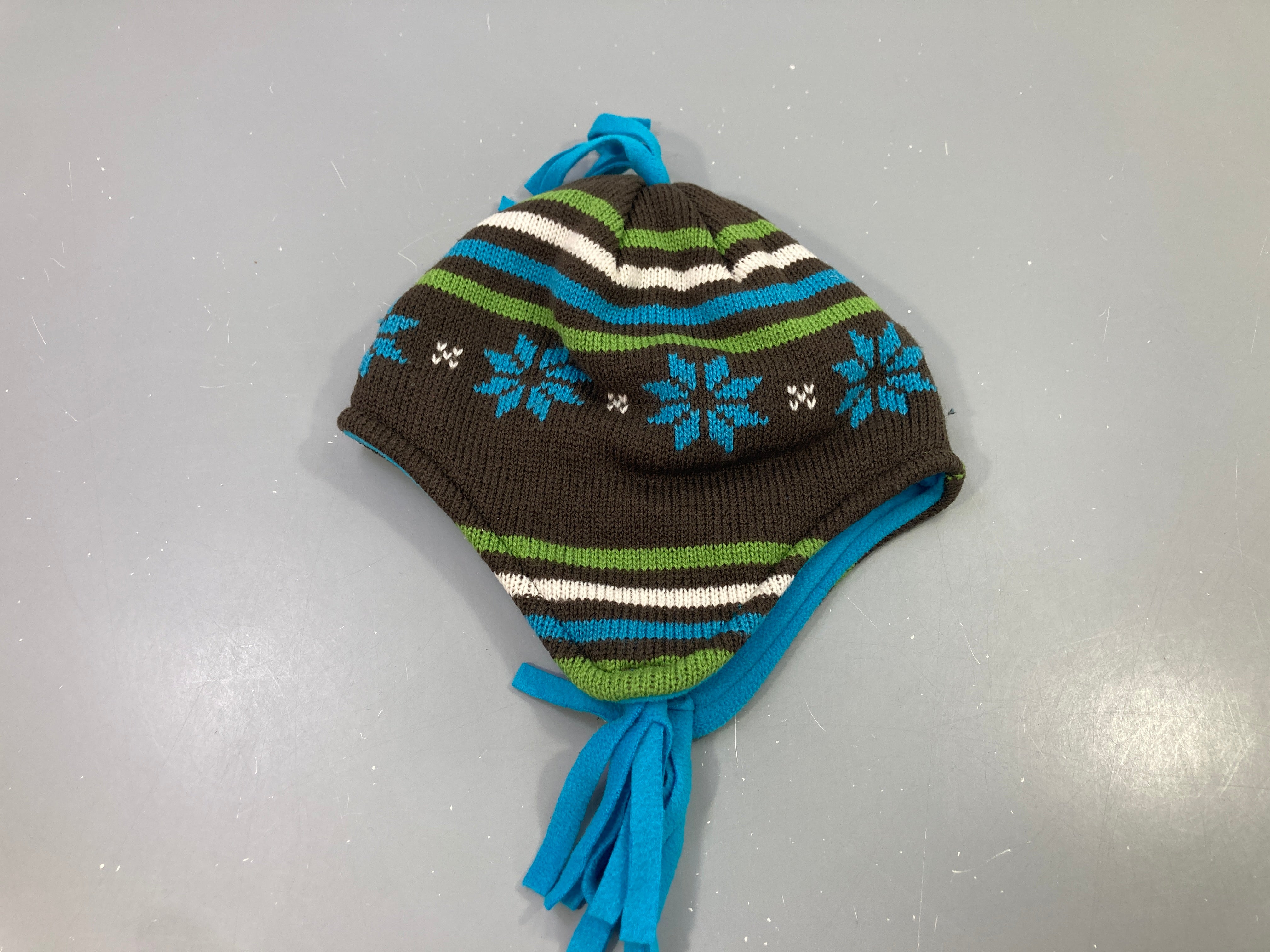 Bonnet tricoté marron bleu flocons doublé polar