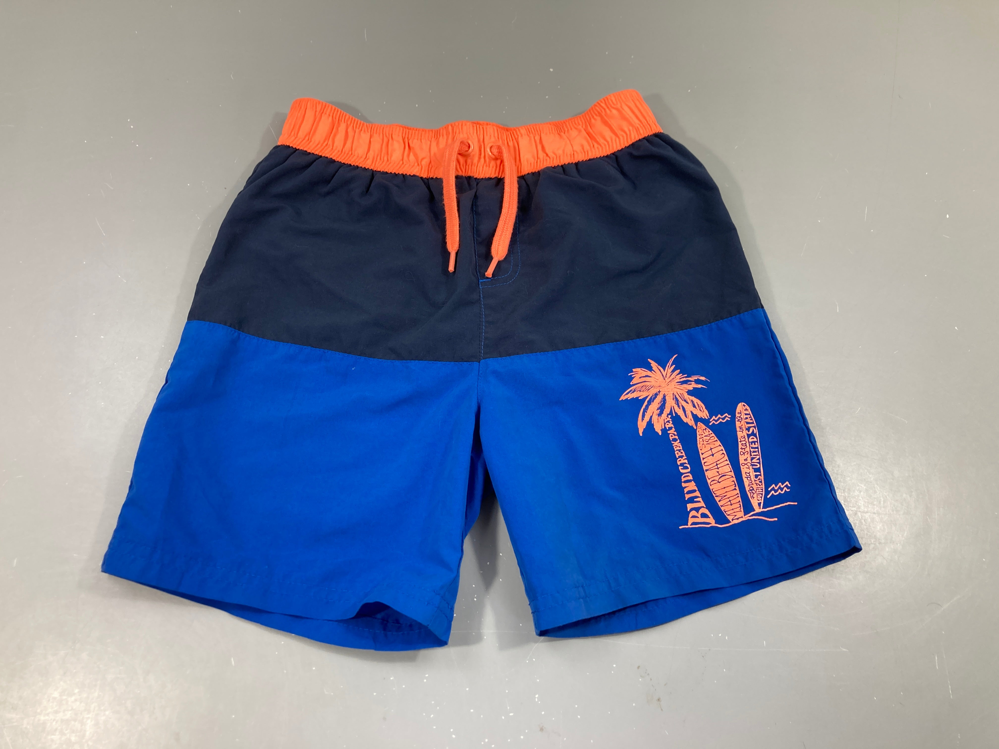 Maillot short bleu palmier corail