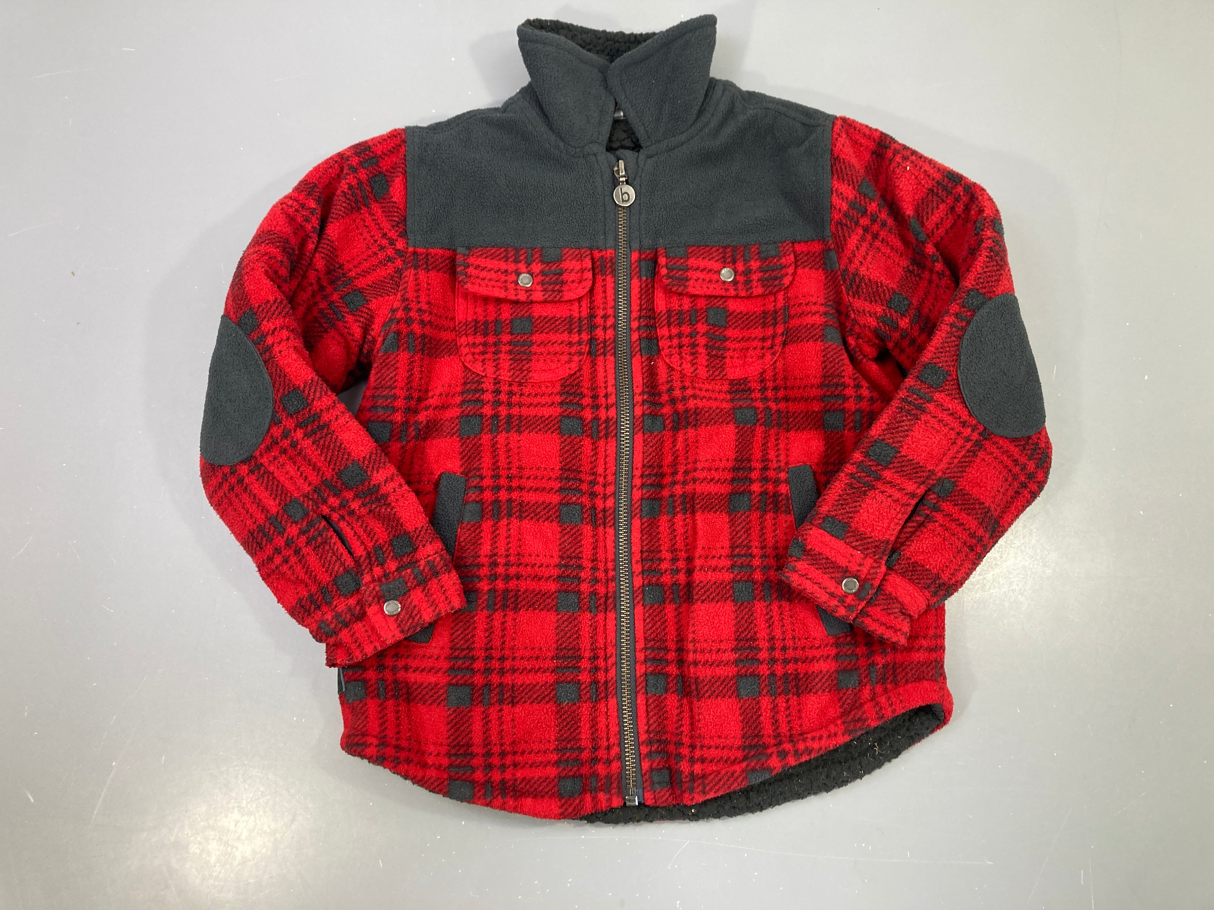 Veste zippée polaire carreaux rouge noir, poches boutonnées