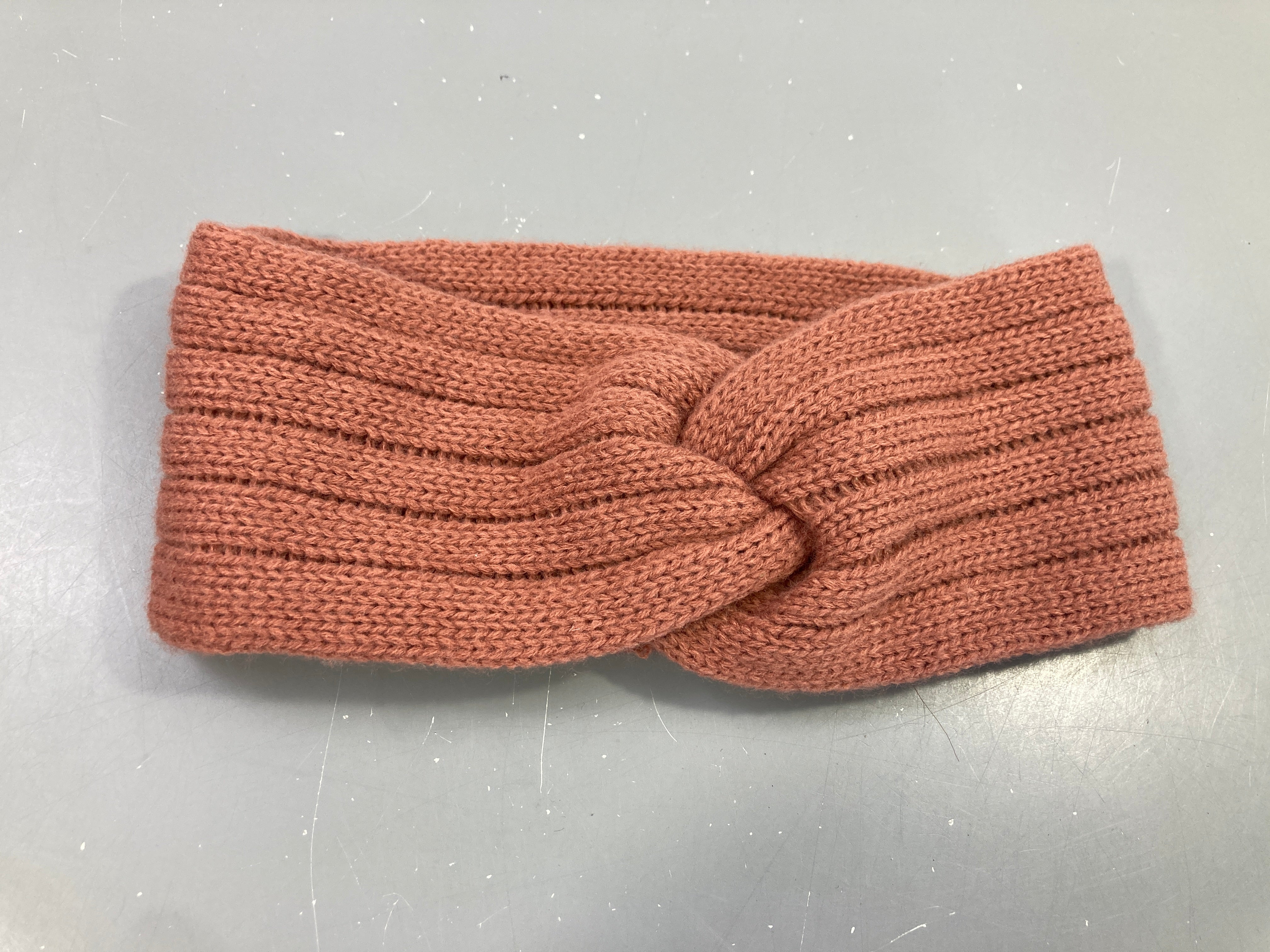 Bandeau tricot terracotta noué