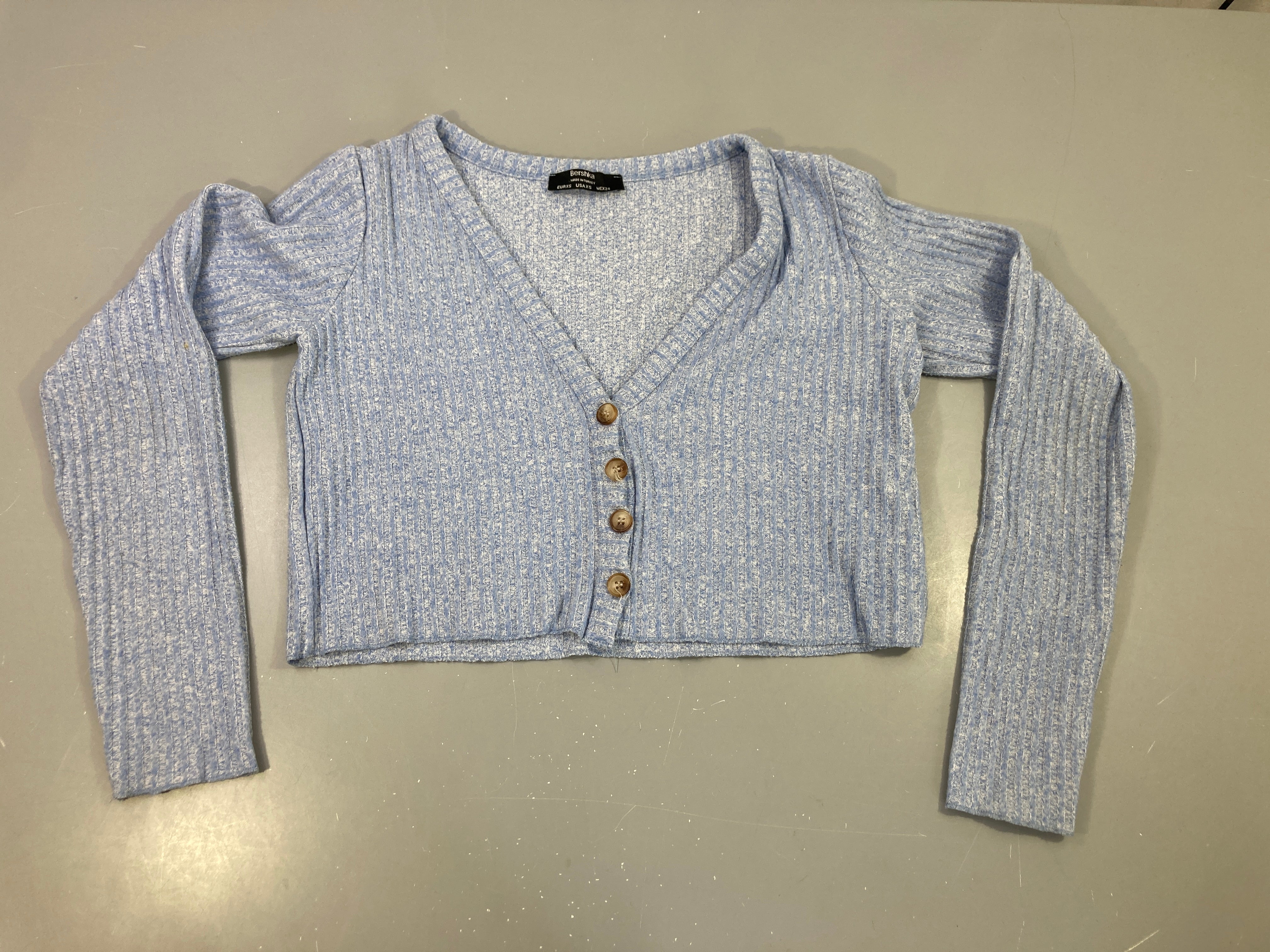 Gilet court bleu chiné boutonné
