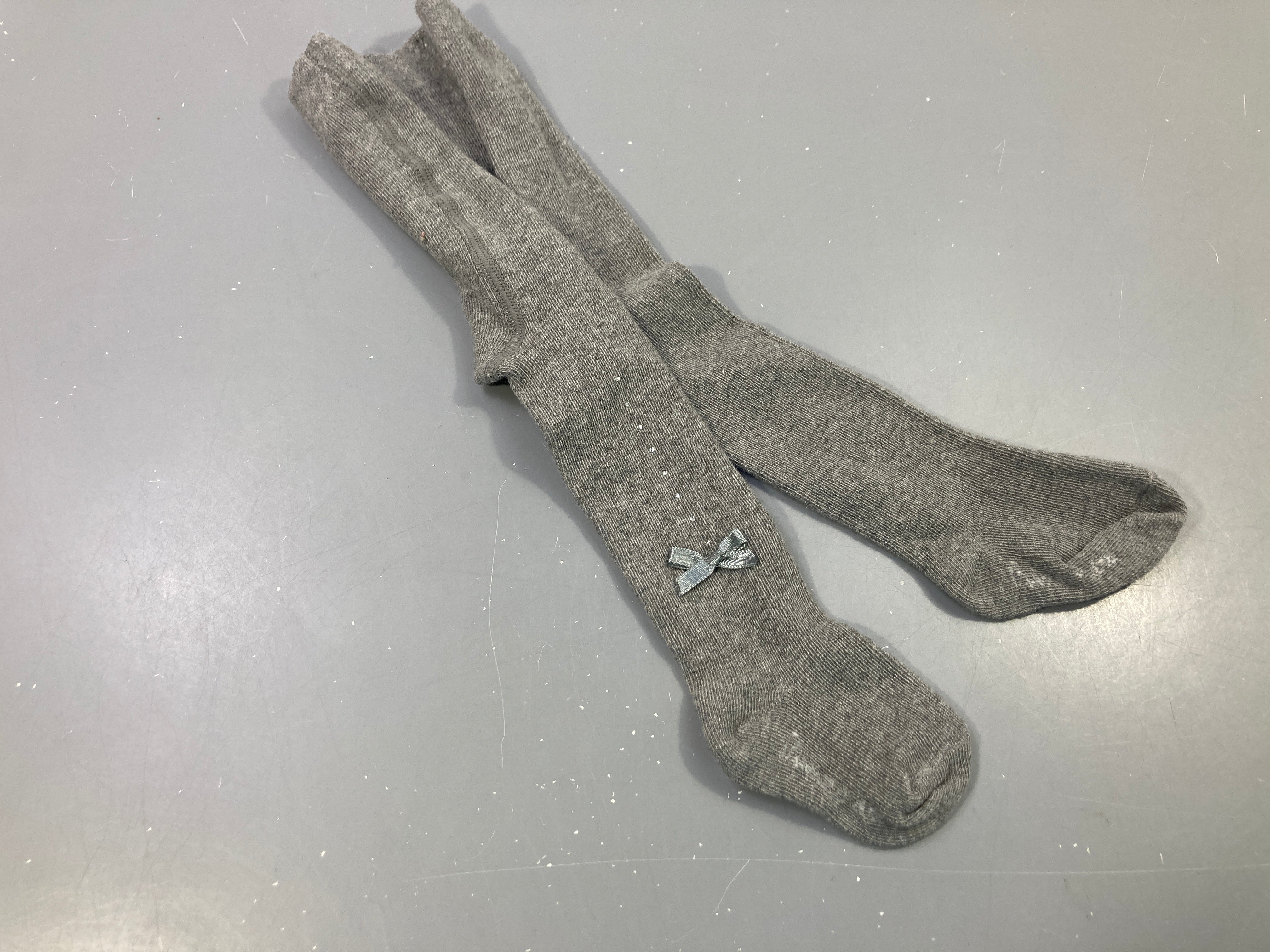 Collants gris chiné, petit nœud