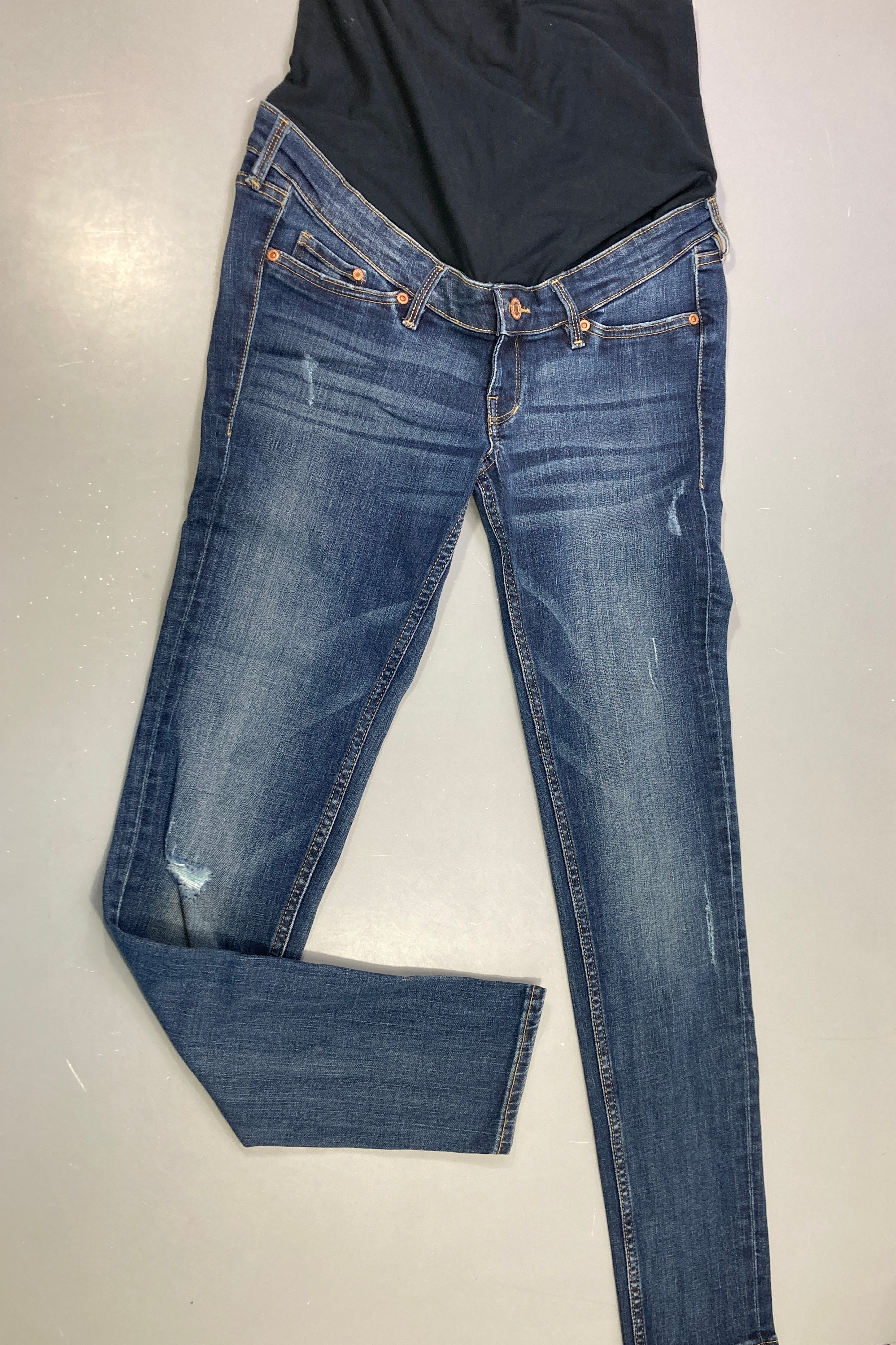 Jean skinny grossesse denim bleu délavé effet érraillé bandeau ventre