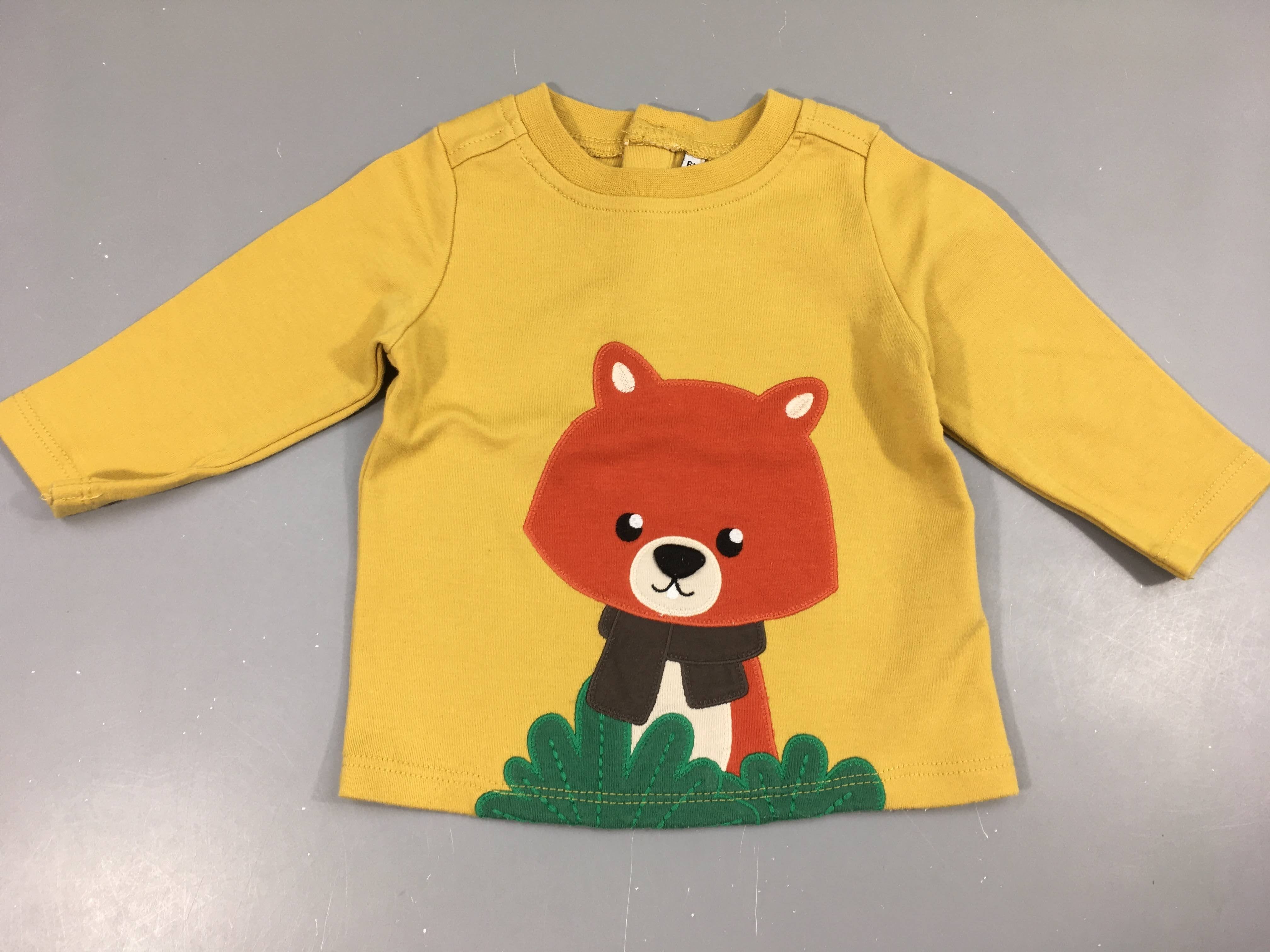 T-shirt m.l jaune renard, très légèrement bouloché