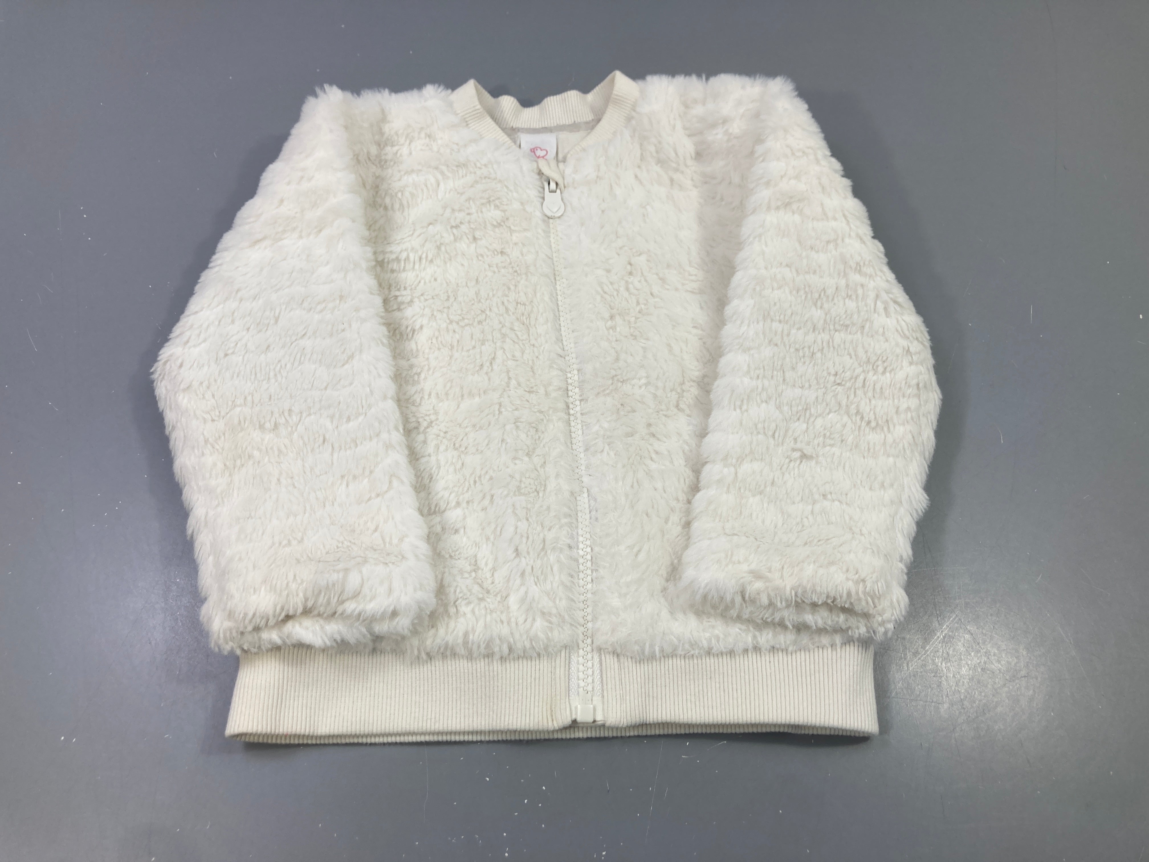 Gilet veste zippée fausse fourrure blanche