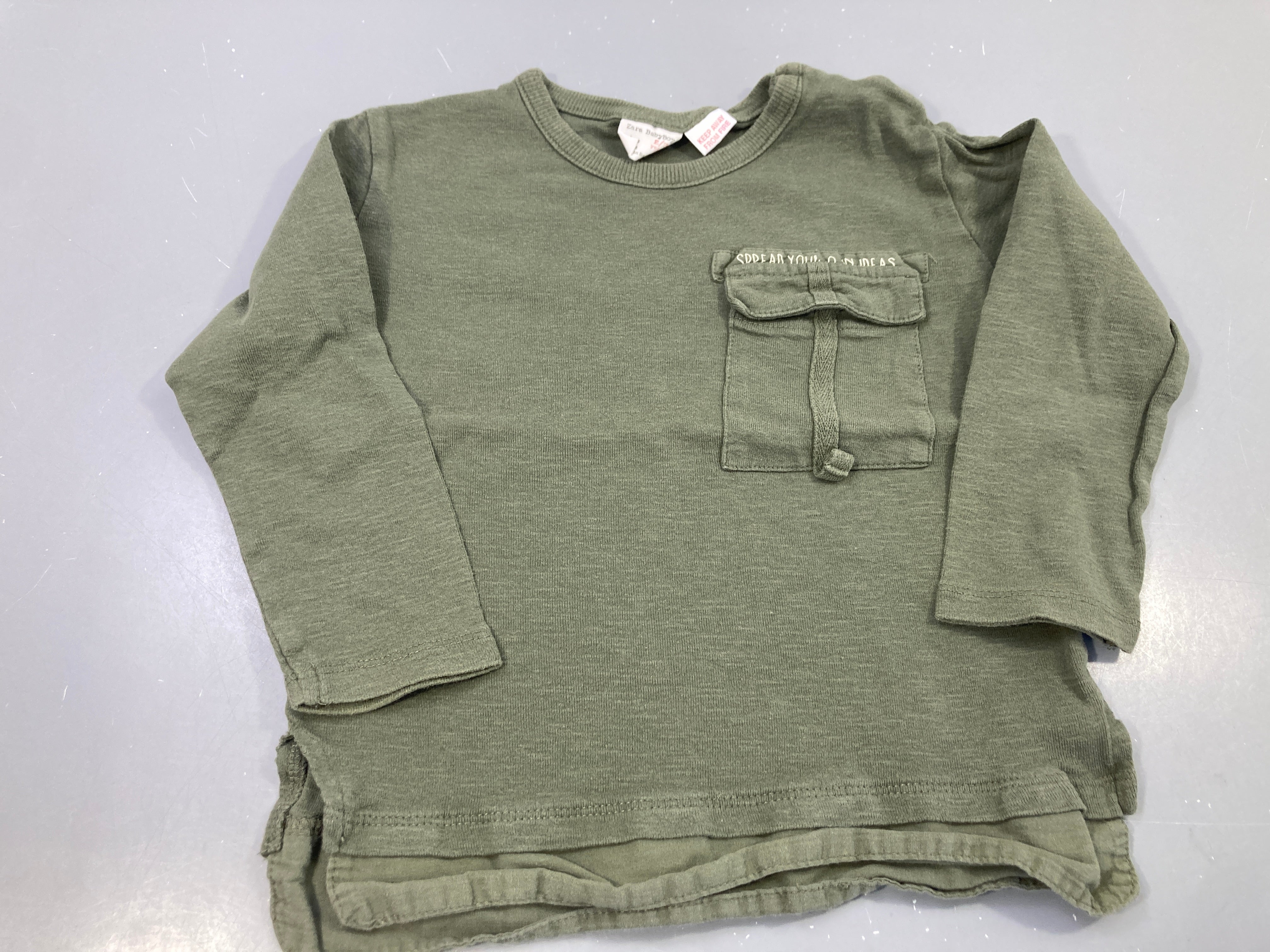 T-shirt m.l kaki, poche Légèrement bouloché