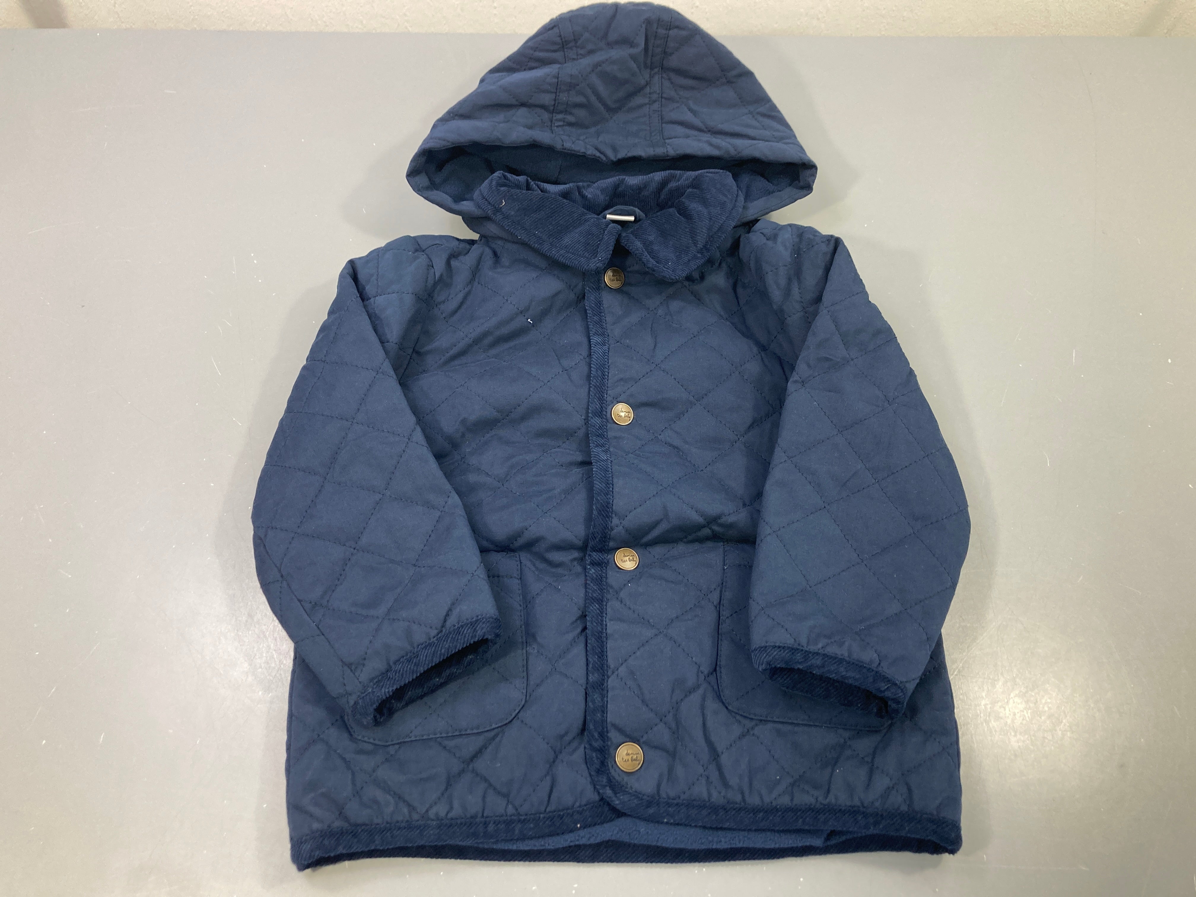 Veste matelassée bleu marine capuche col velours