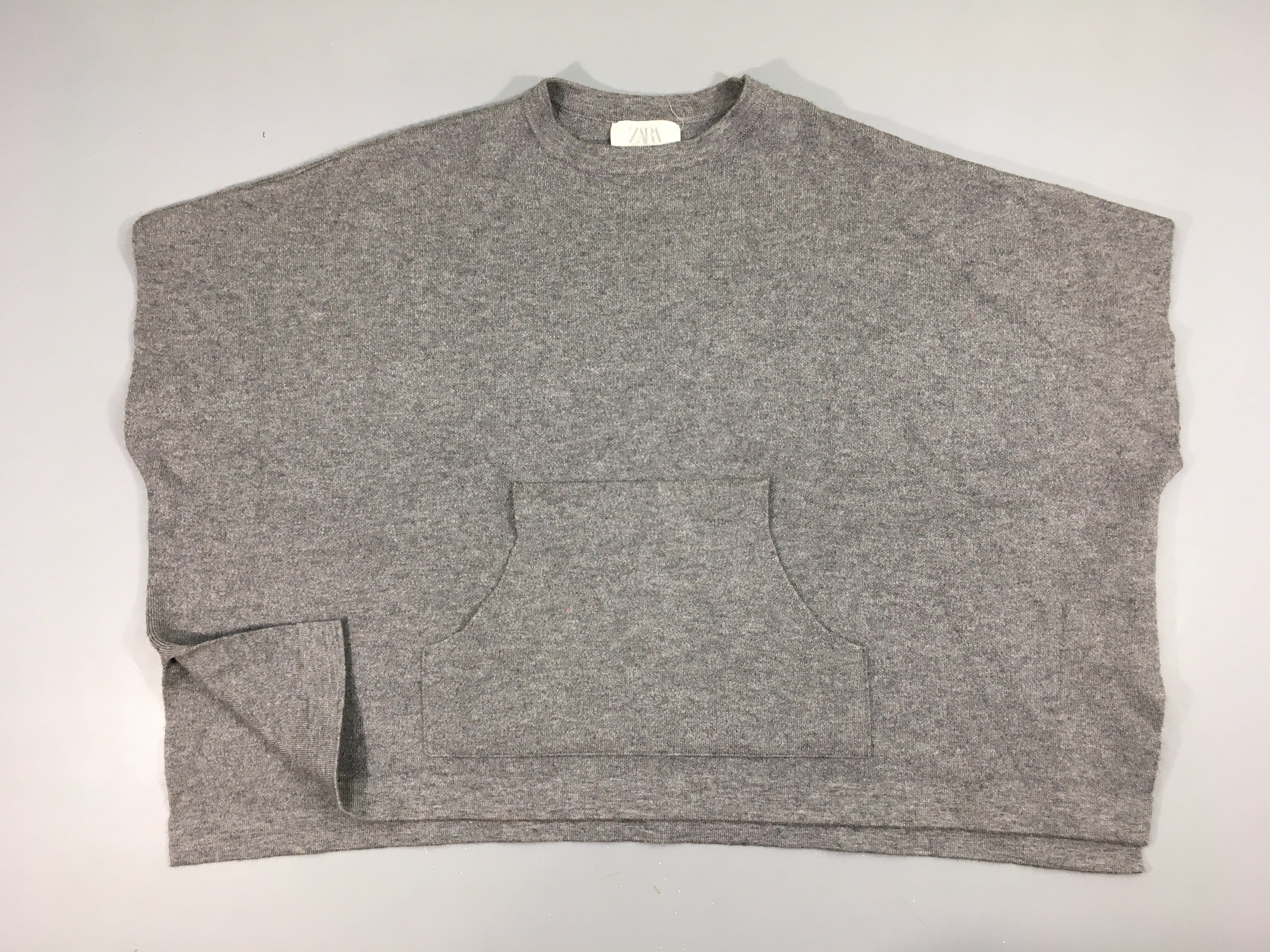 Poncho gris