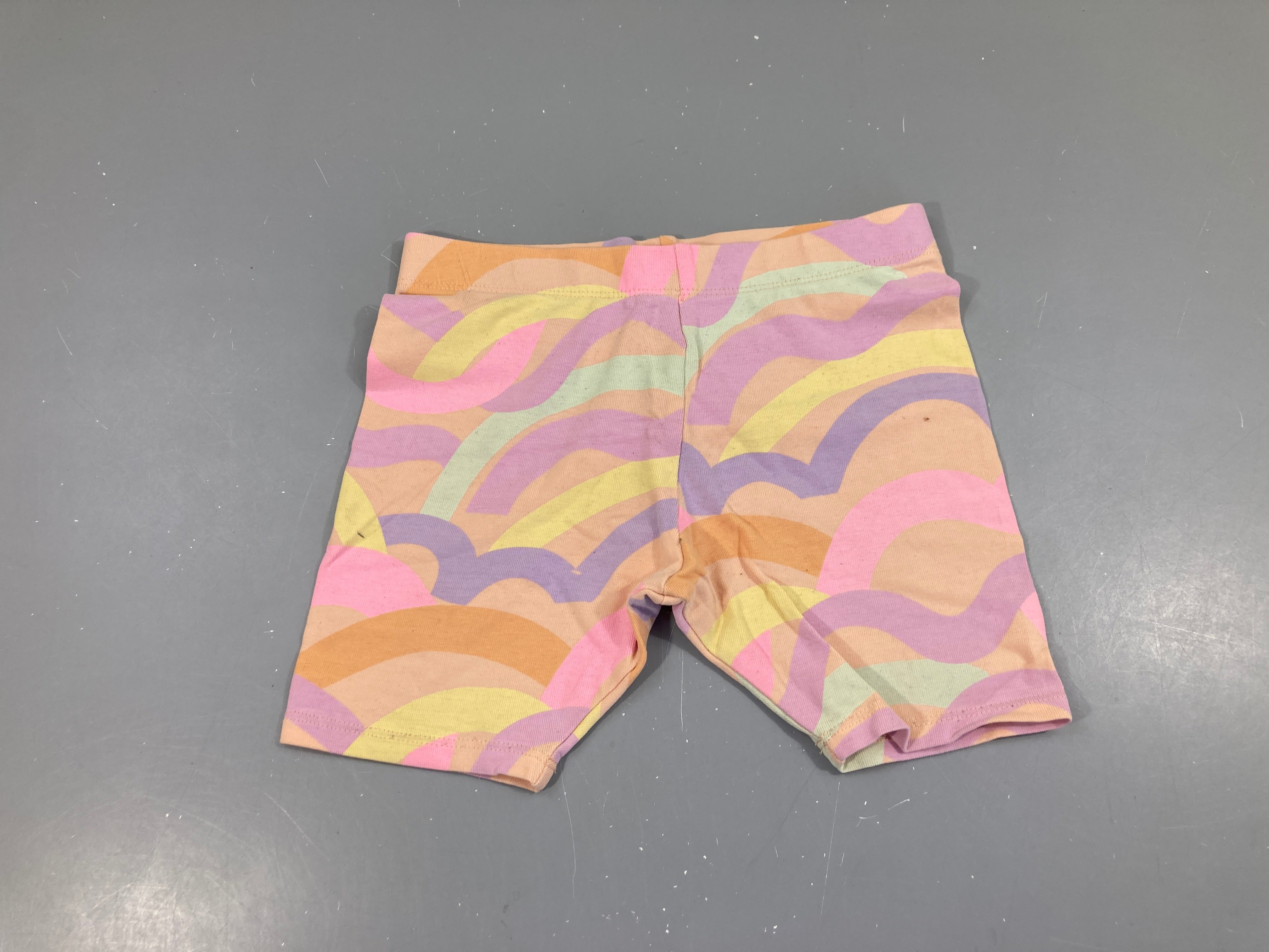Legging short orange traits multicolore