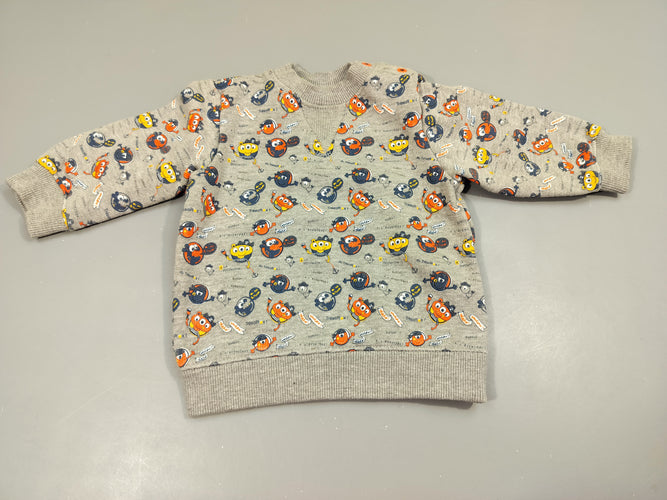 Sweat gris clair chiné, motifs monstres  jaunes, orange, bleus,..., intérieur doux et chaud 70% coton 30%  polyester, moins cher chez Petit Kiwi