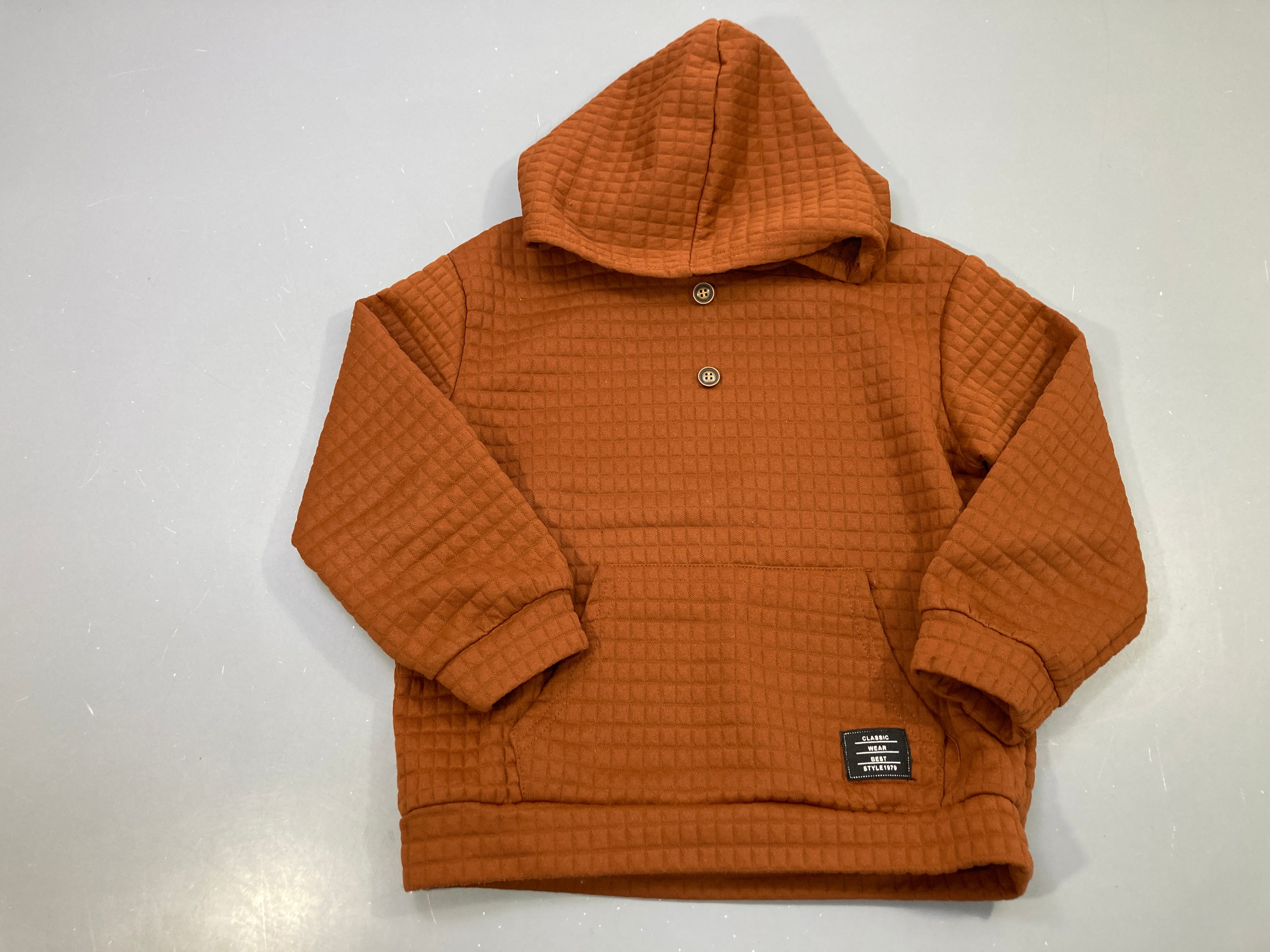 Sweat capuche ocre gaufré, boutons