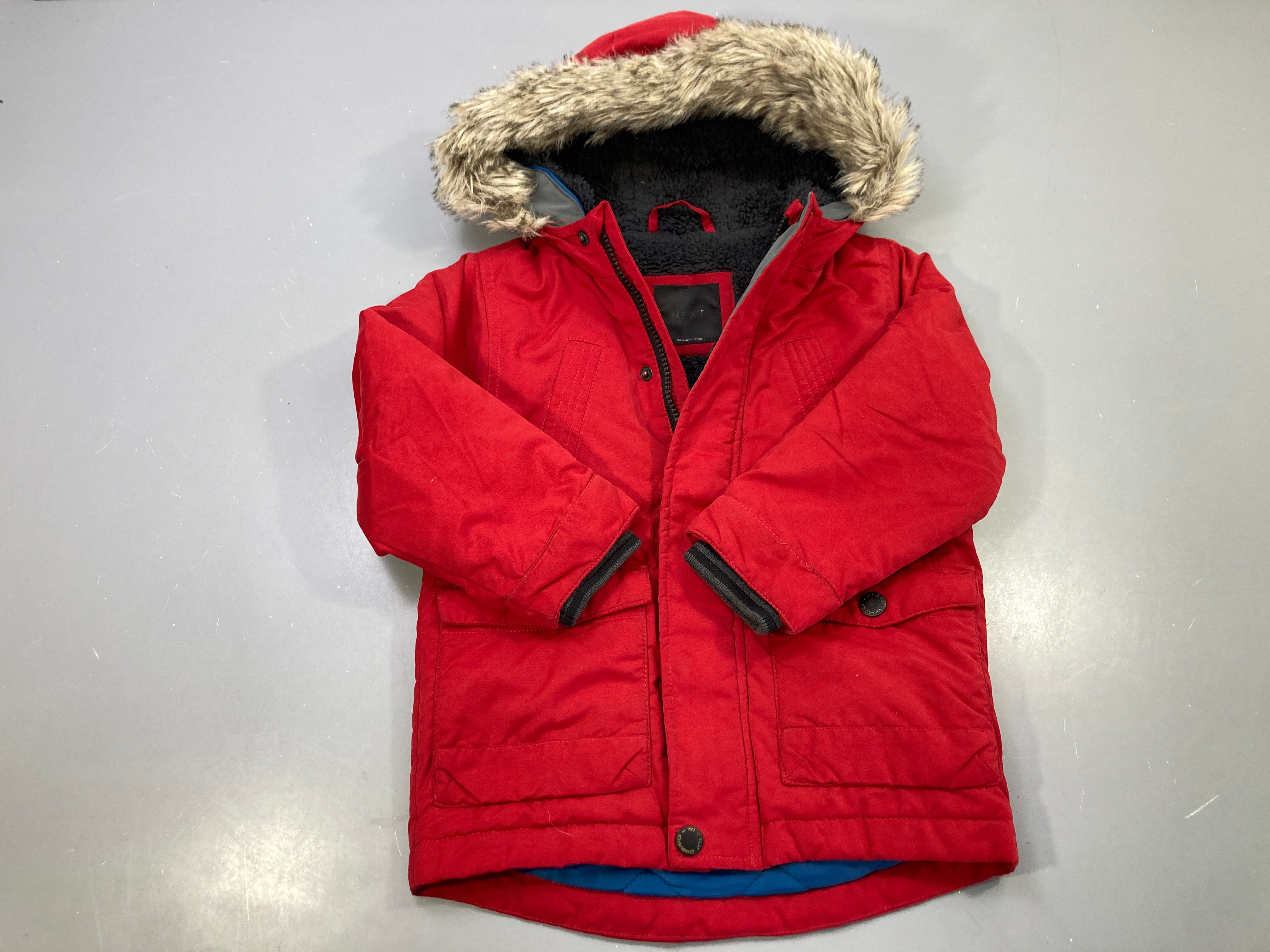 Parka rouge capuche fausse fourrure