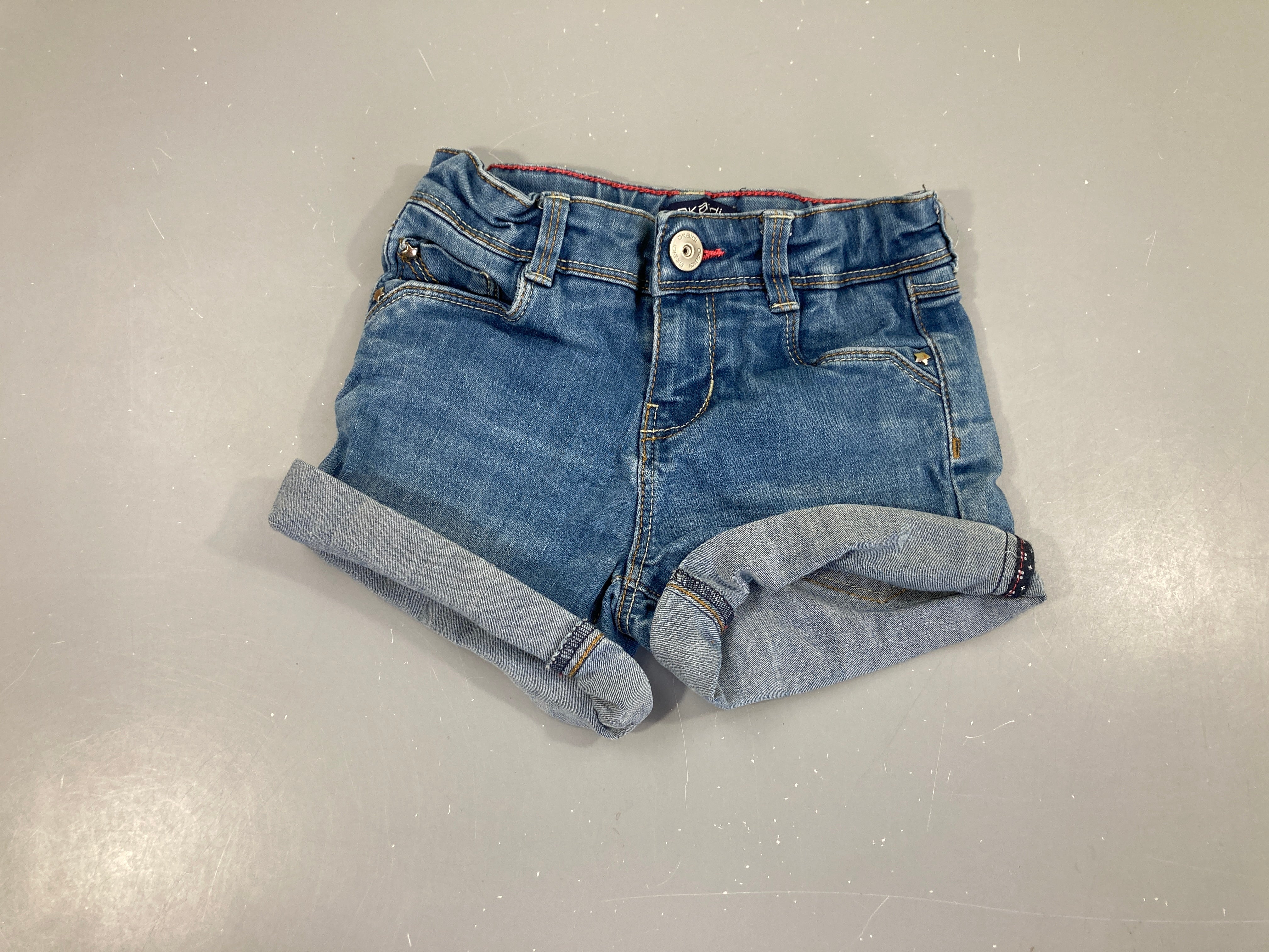 Short denim à revers
