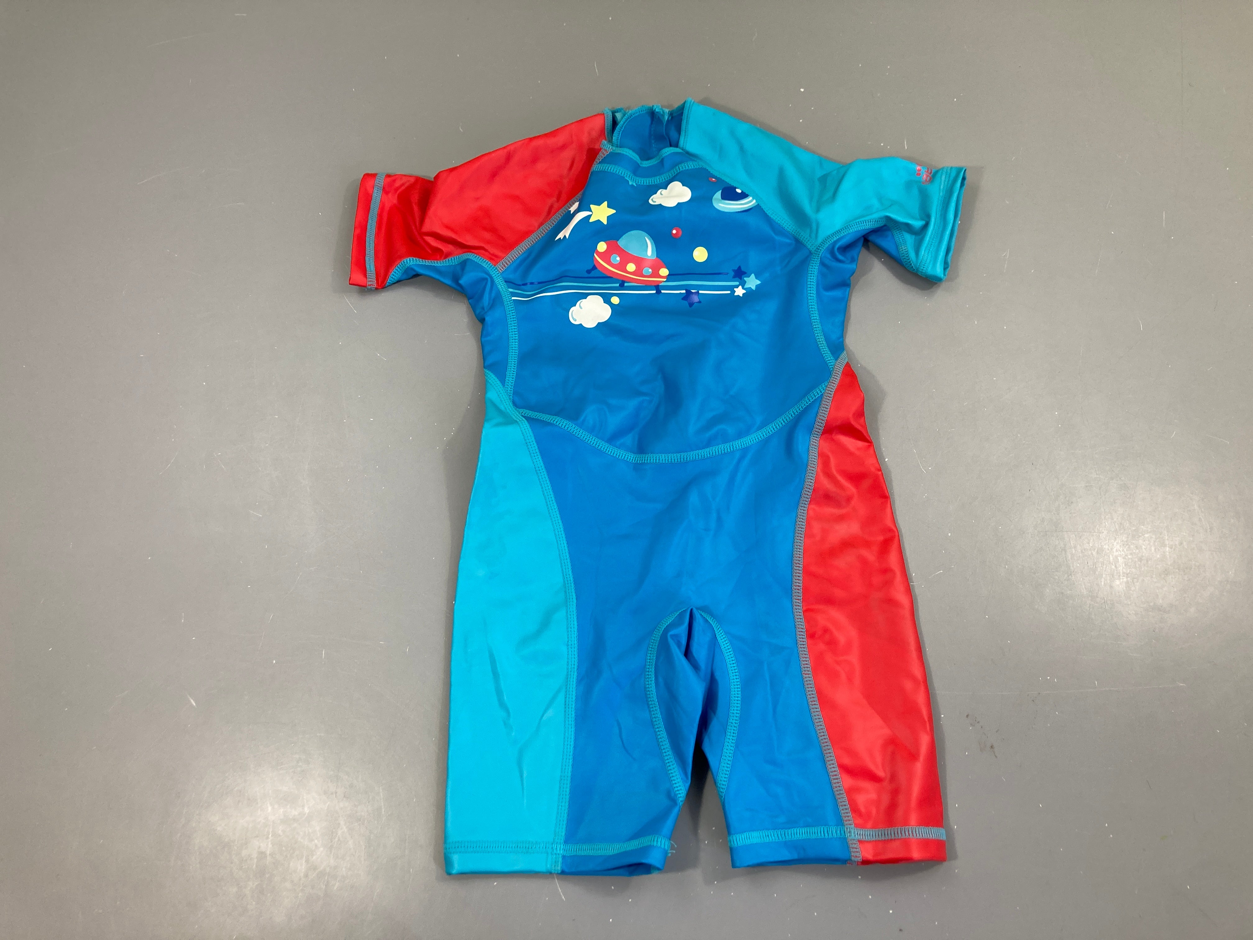 Combinaison anti-froid bleu/rouge (taille estimée)