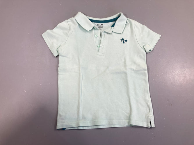 Polo m.c bleu clair palmiers, moins cher chez Petit Kiwi