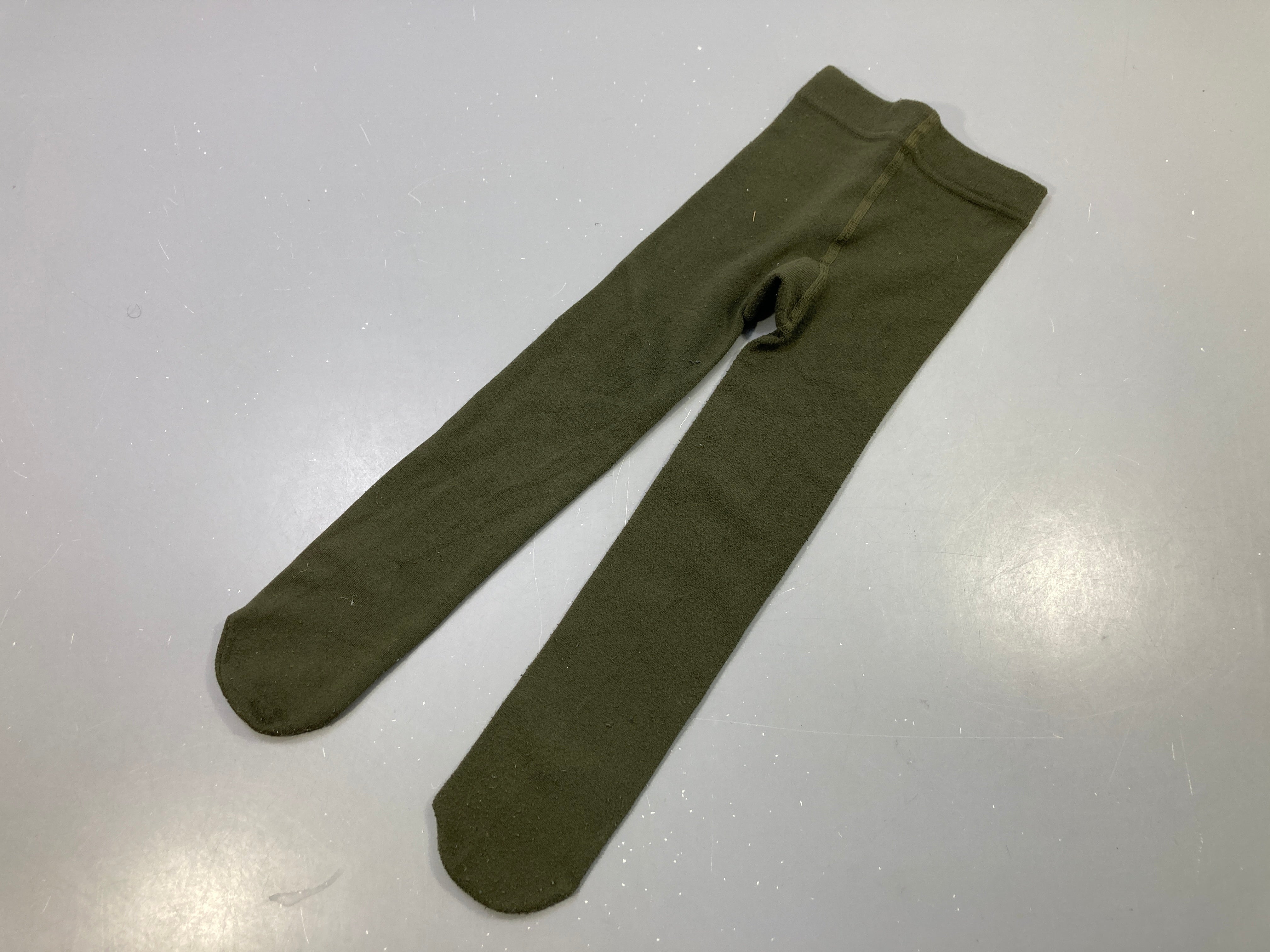 Collant vert kaki, bouloché