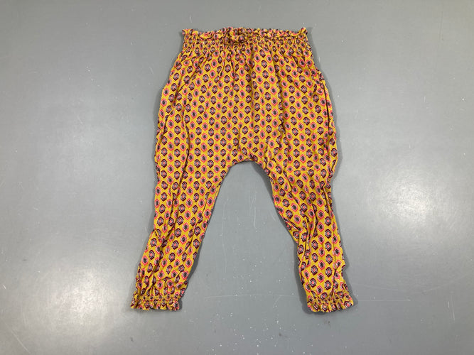 Pantalon fluide orange motifs rose, moins cher chez Petit Kiwi