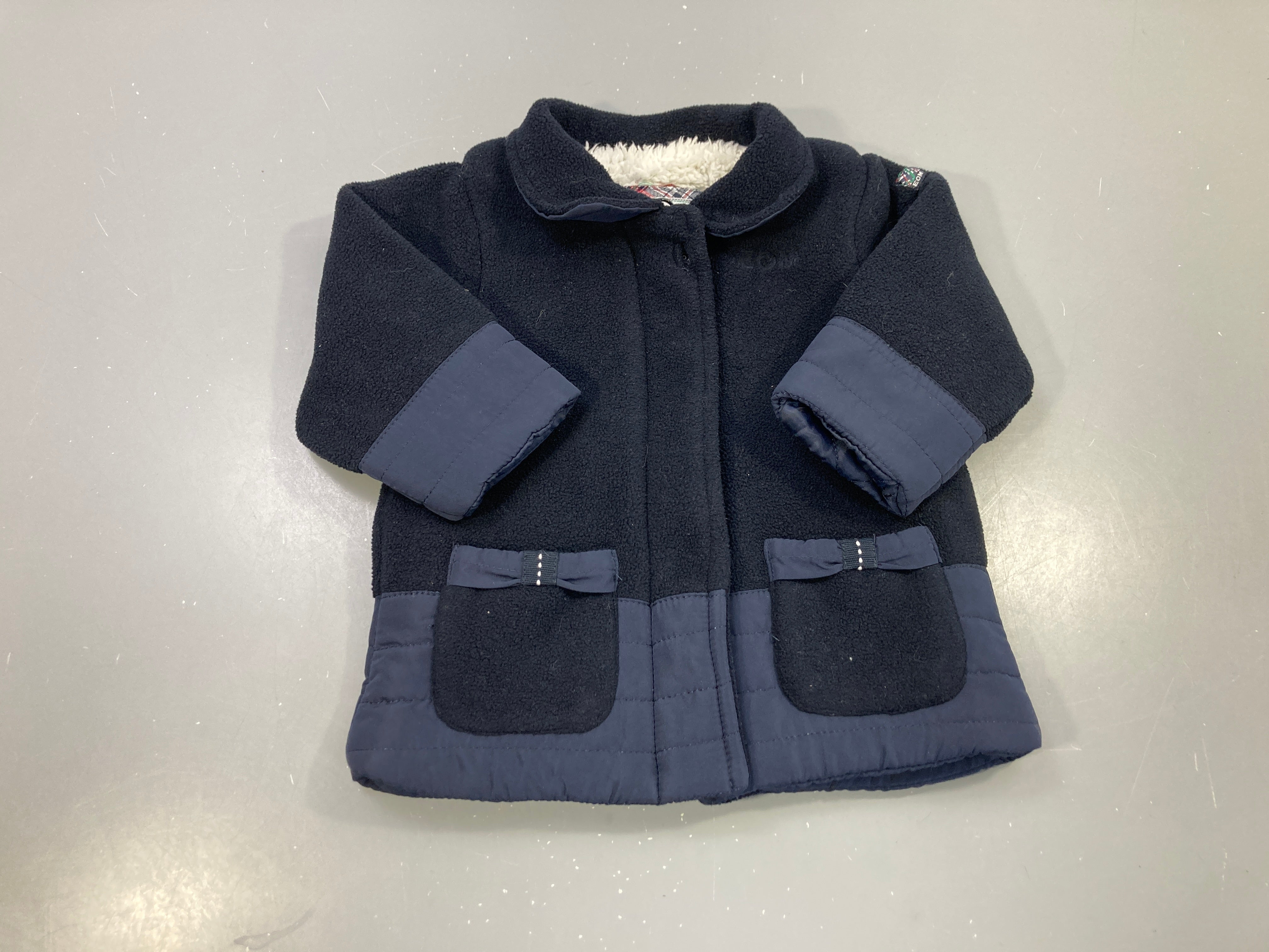 Manteau polaire bleu marine, doublure sherpa, poches nœuds
