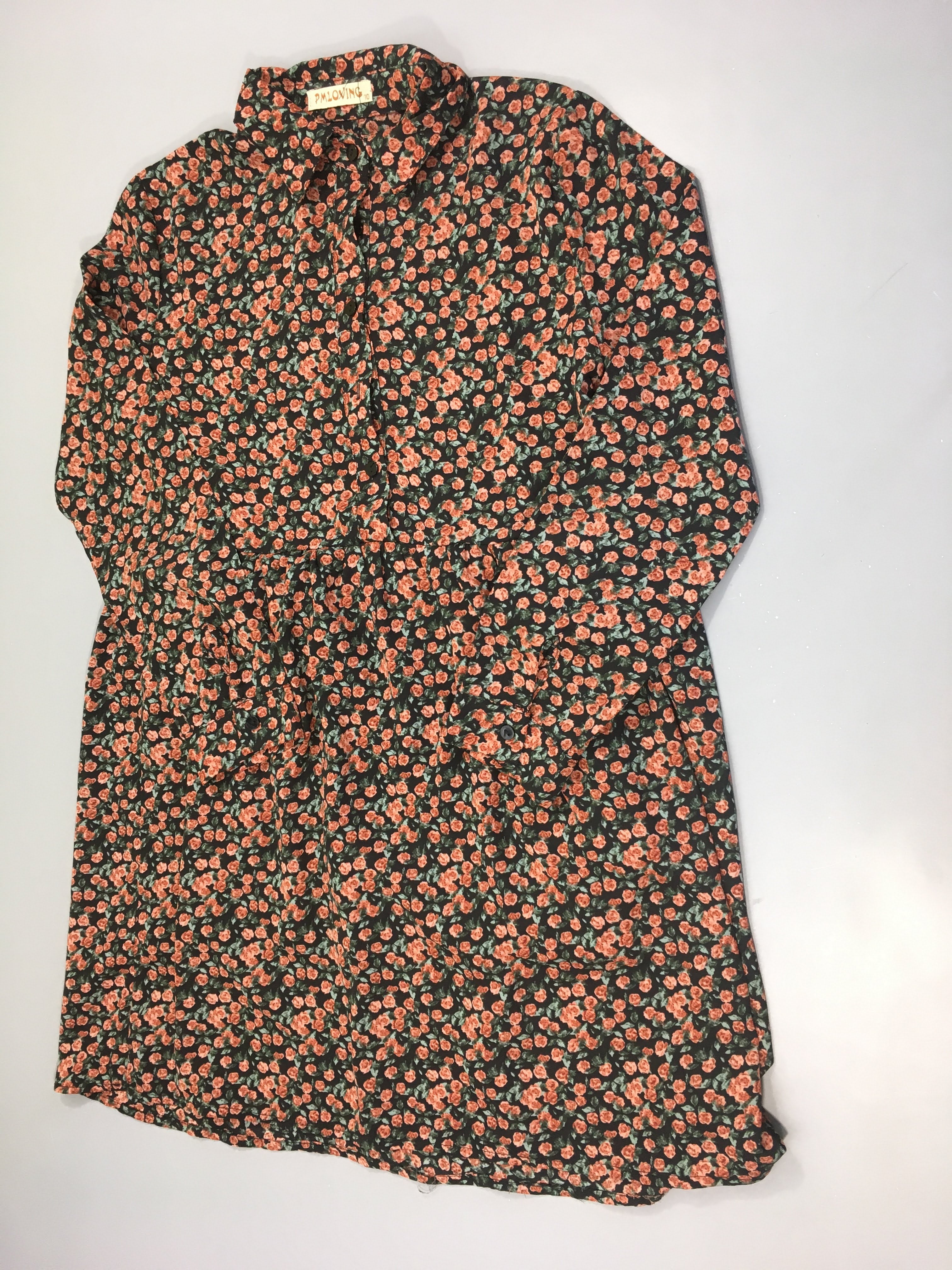 Robe m.l noire fleurie de roses