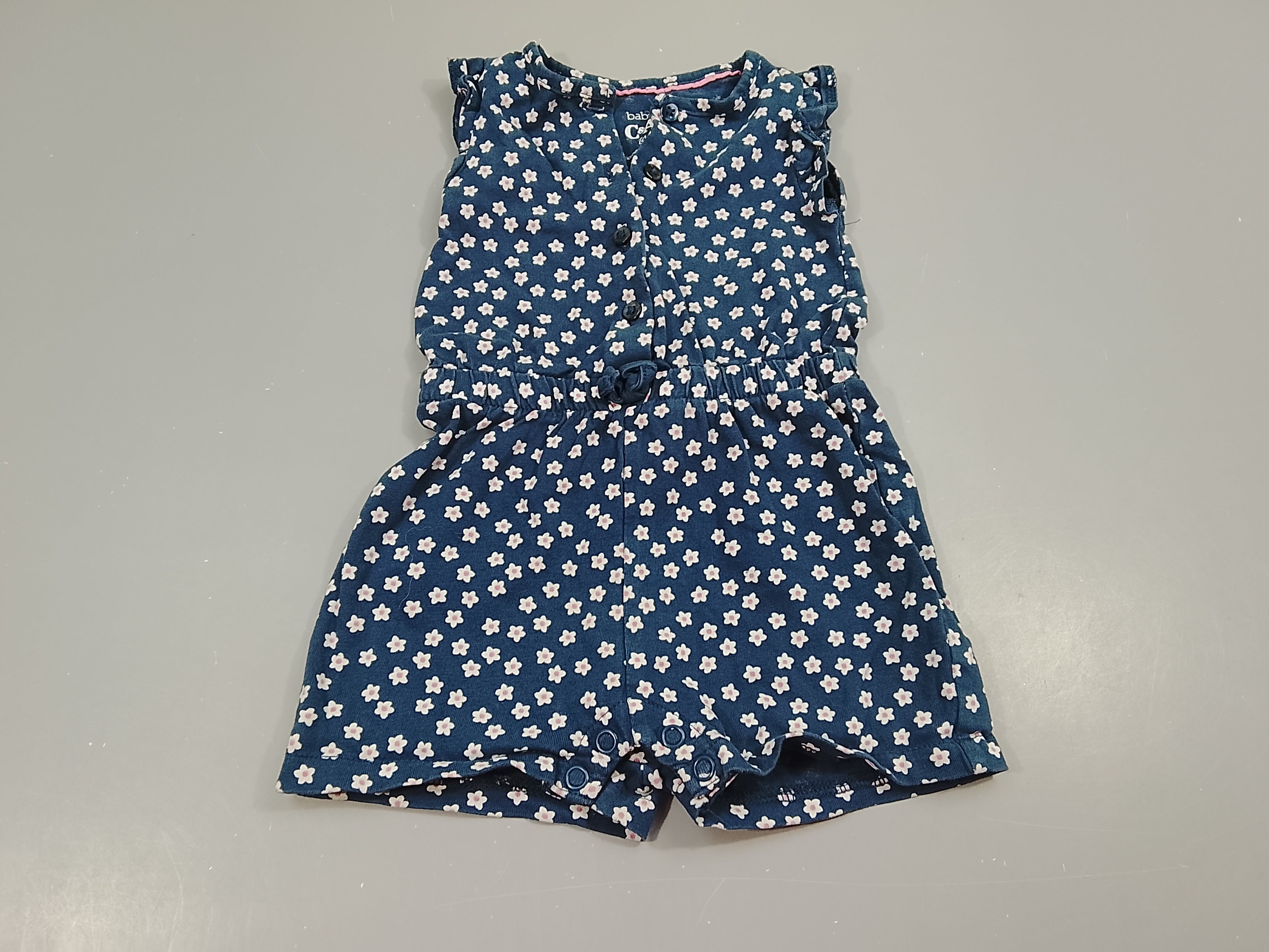 Combishort bleue à fleurs blanches