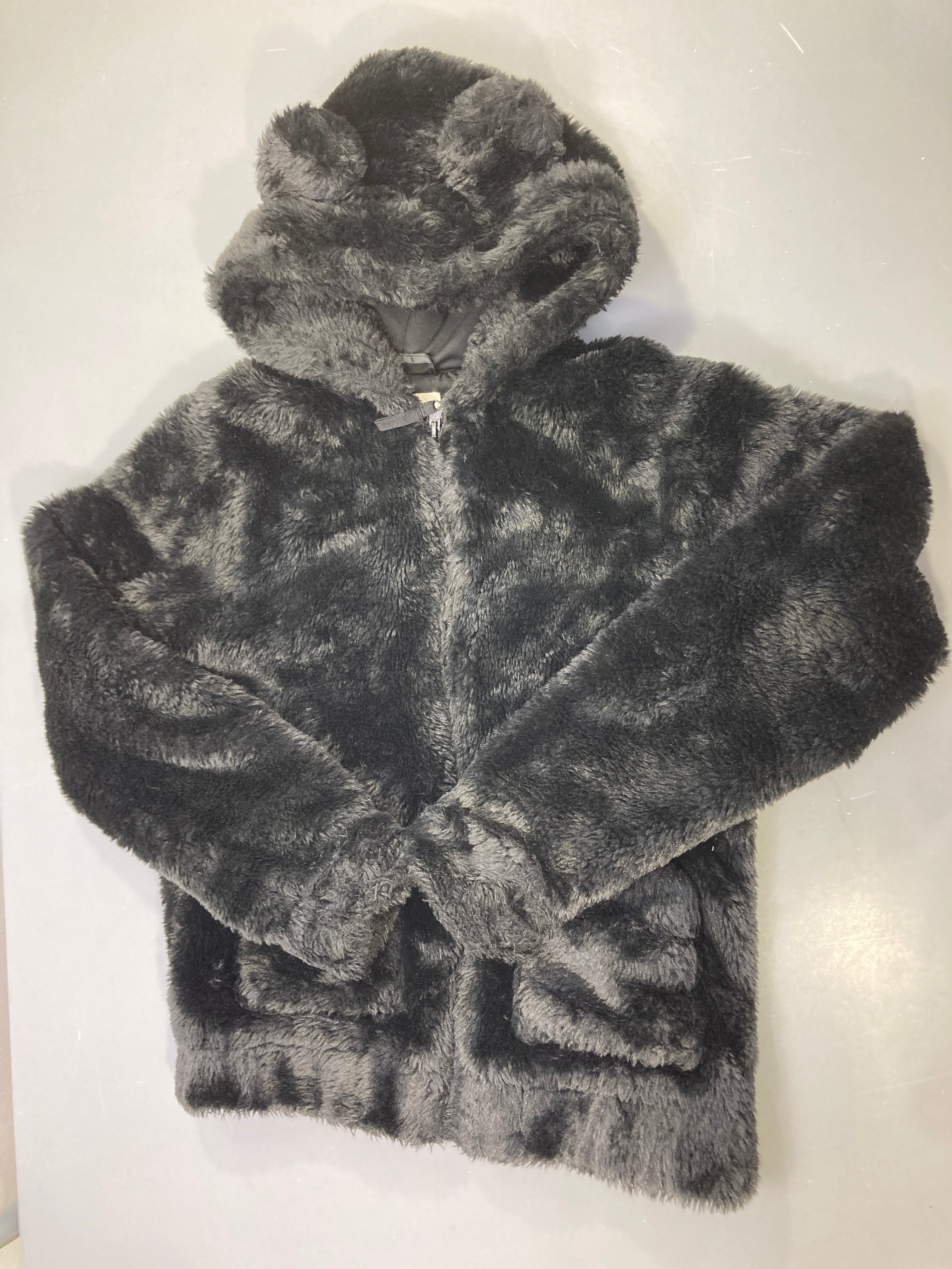 Veste noire fausse fourrure zippée, capuche à oreilles