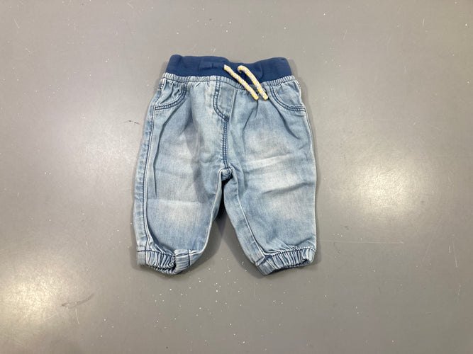 Pantalon denim clair, taille et chevilles élastiques, moins cher chez Petit Kiwi