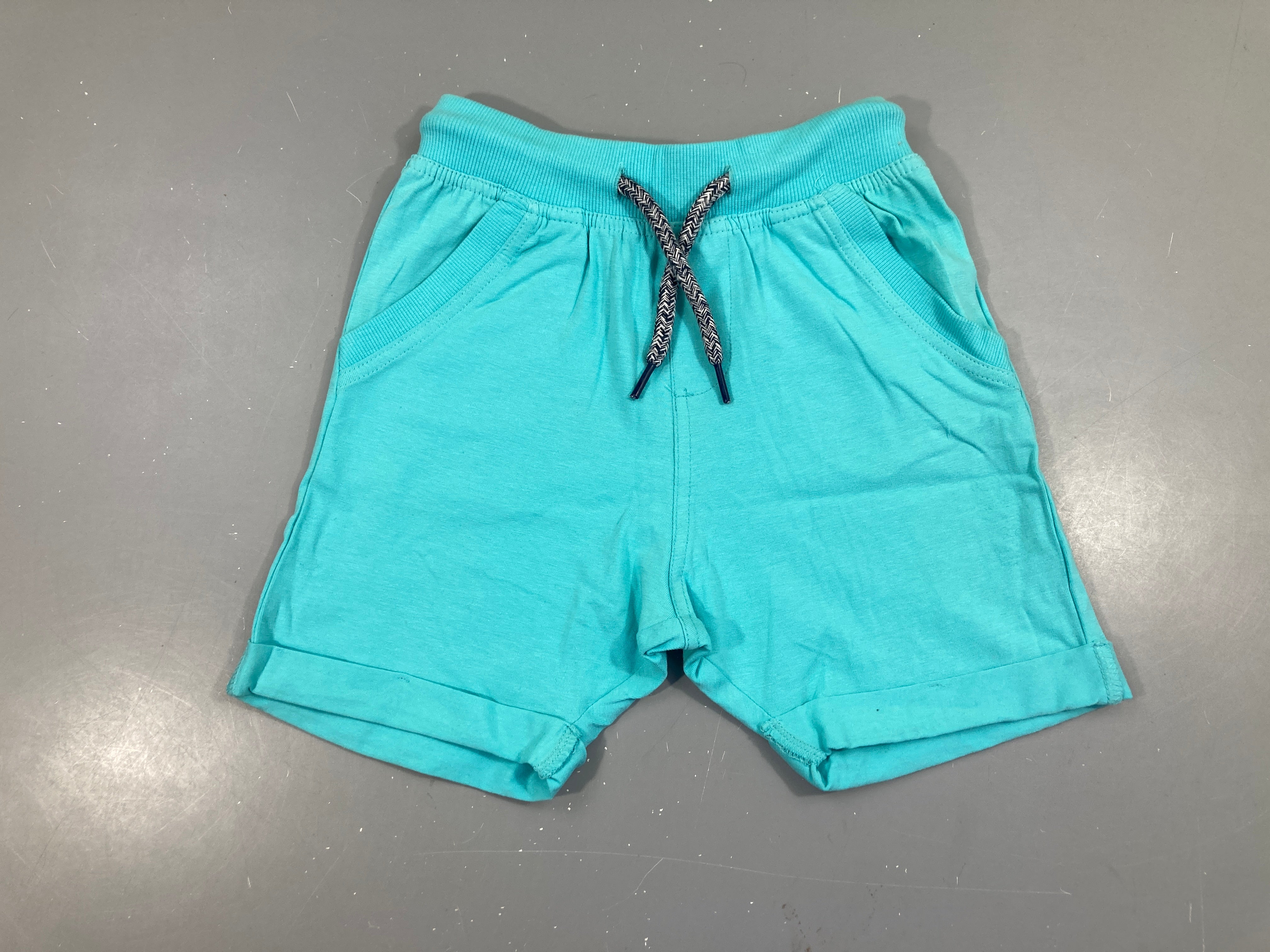 Bermuda jersey turquoise à revers