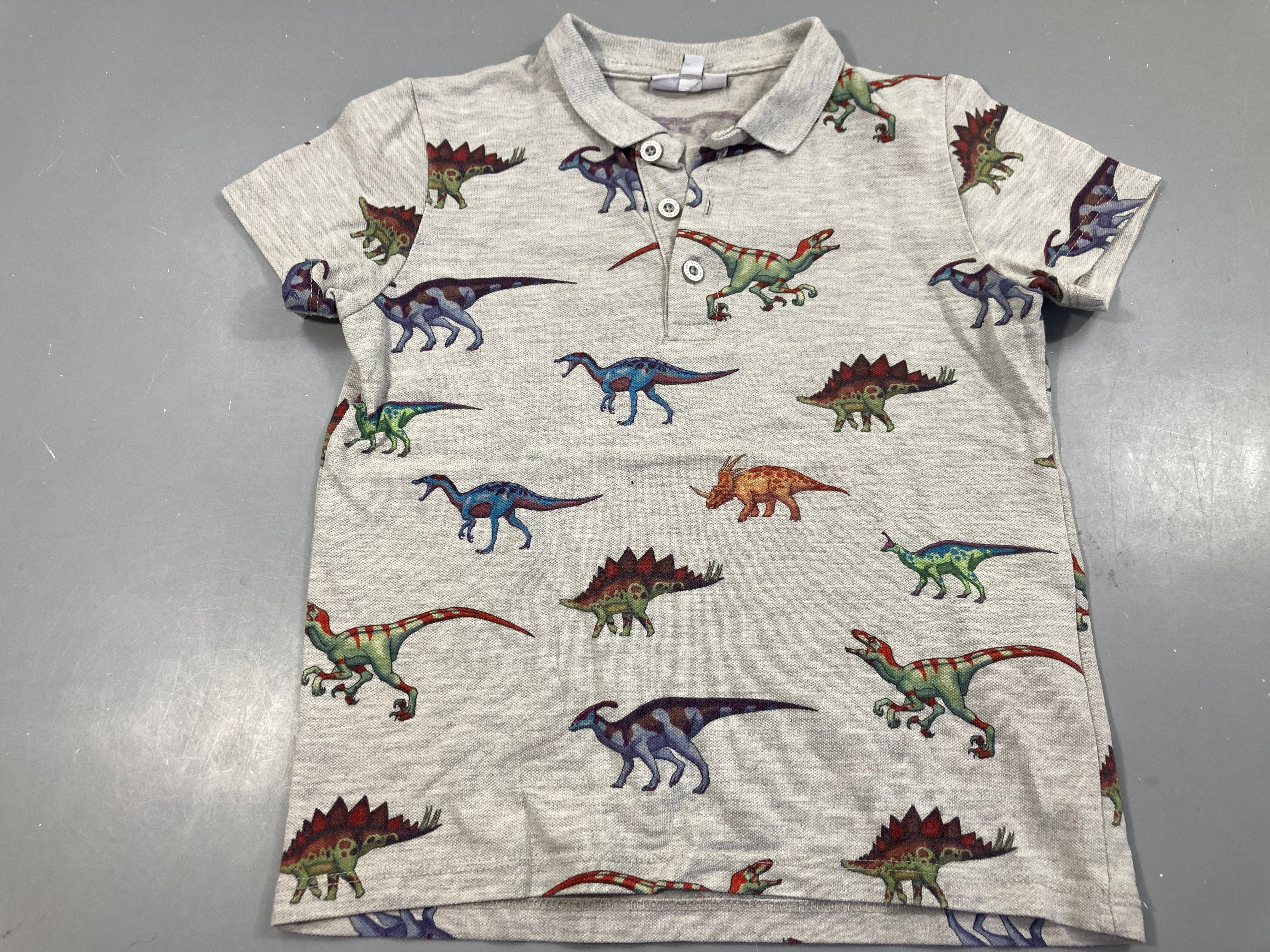 Polo m.c gris dinos