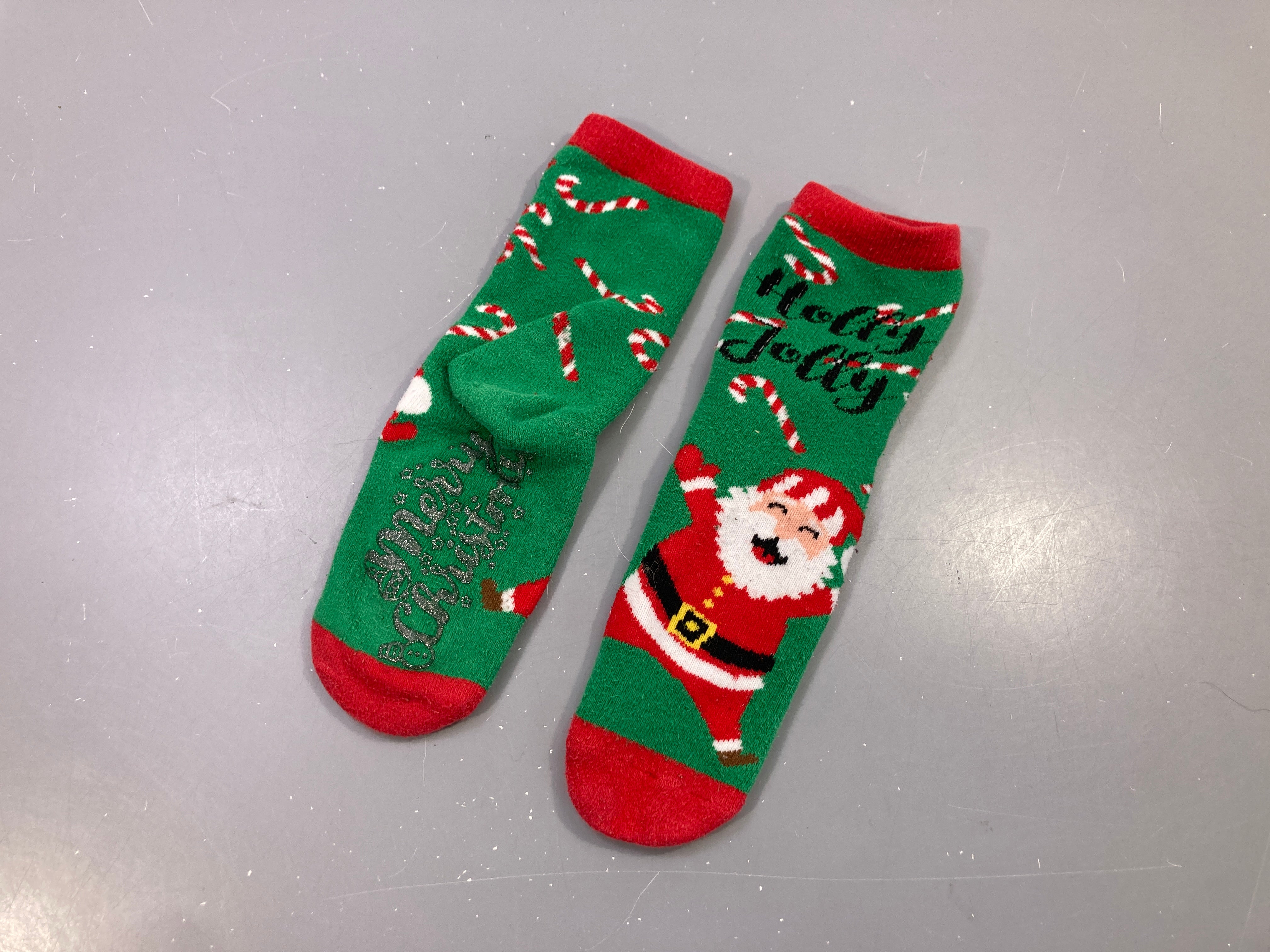 Chaussettes vertes Père Noël « Holly Jolly » sucres d'orge, sucre d'orge