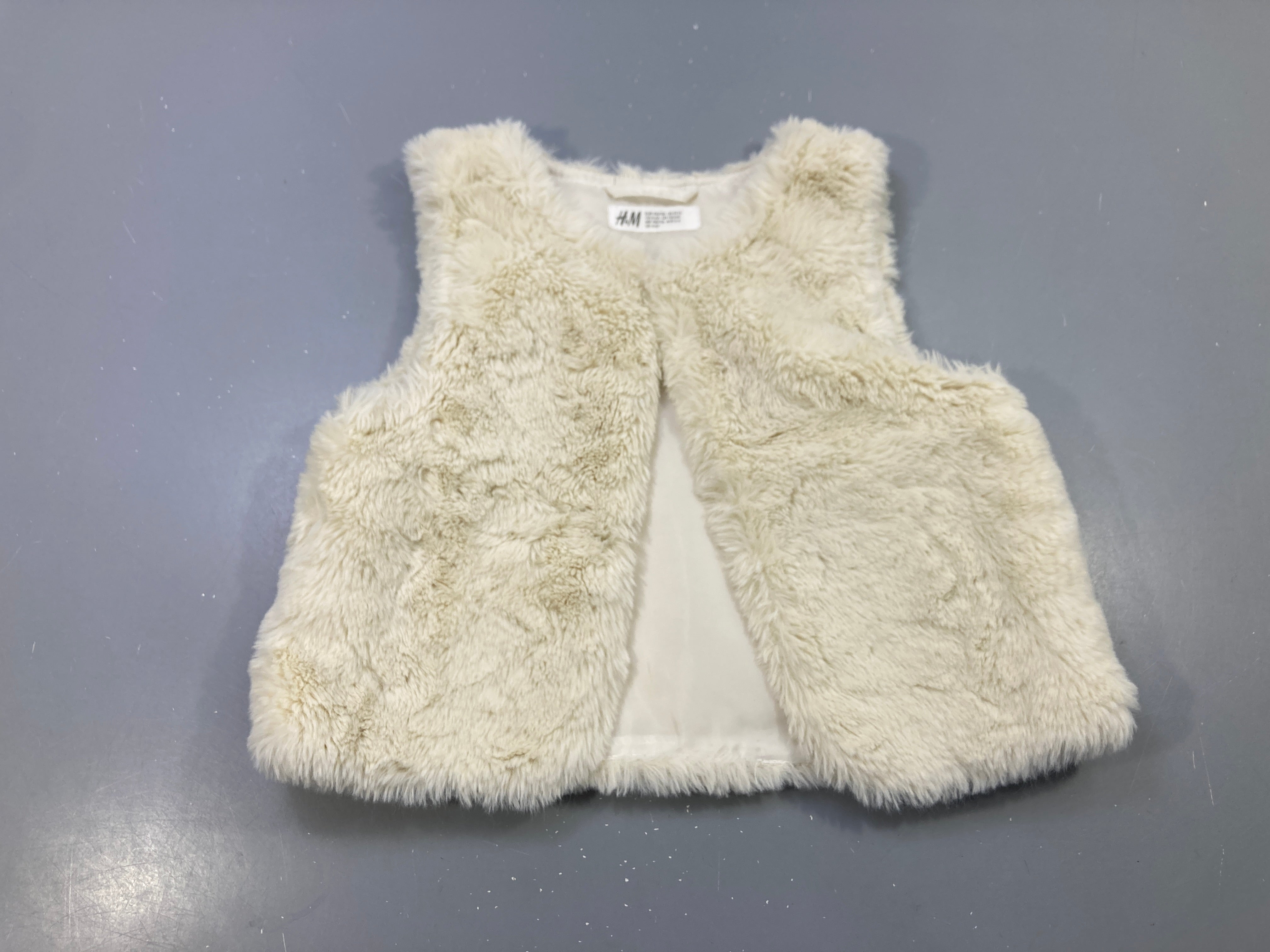 Gilet s.m écru fausse fourrure