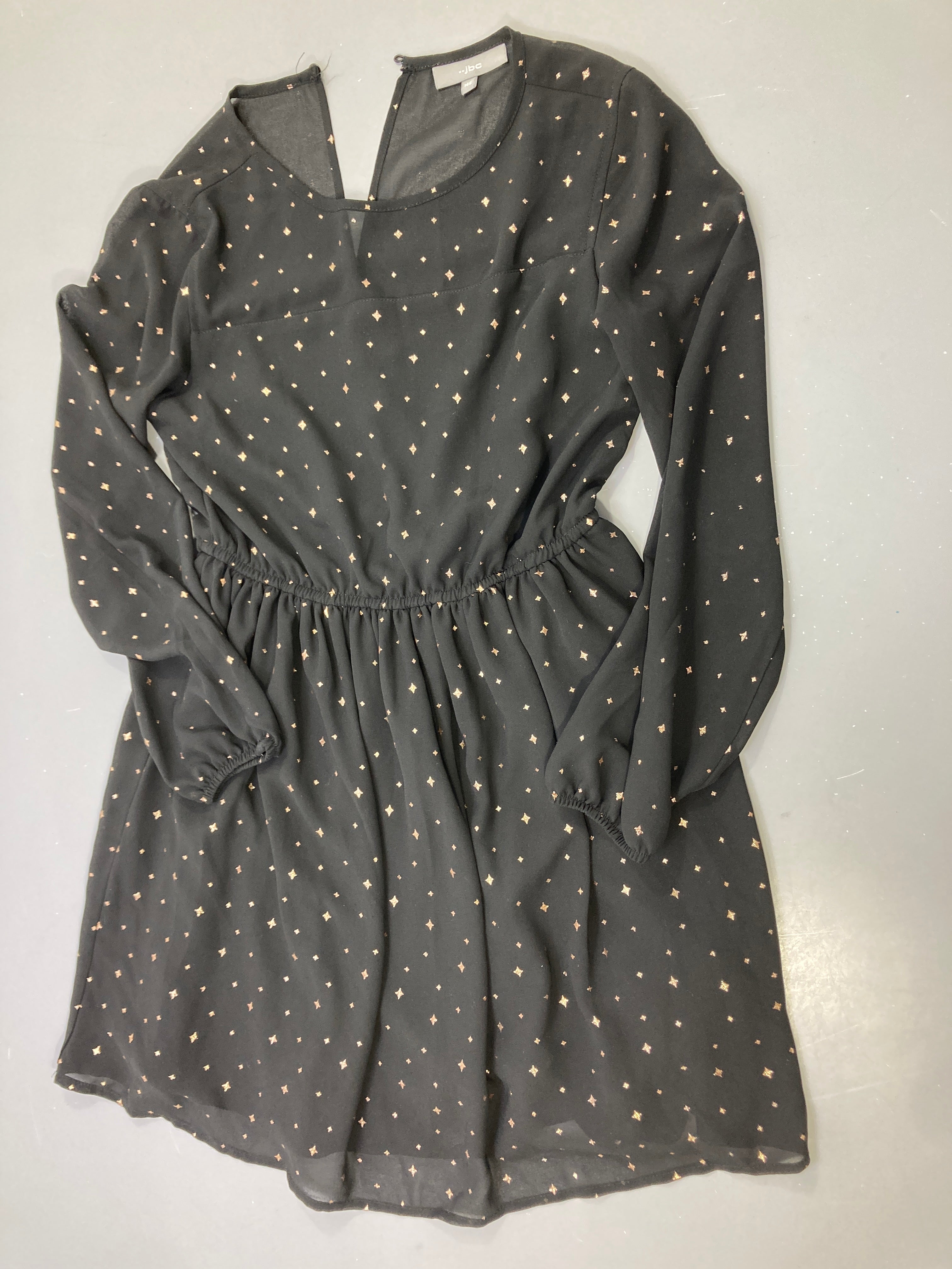 Robe m.l noire voile étoiles dorées, taille élastique Un strass décollé
