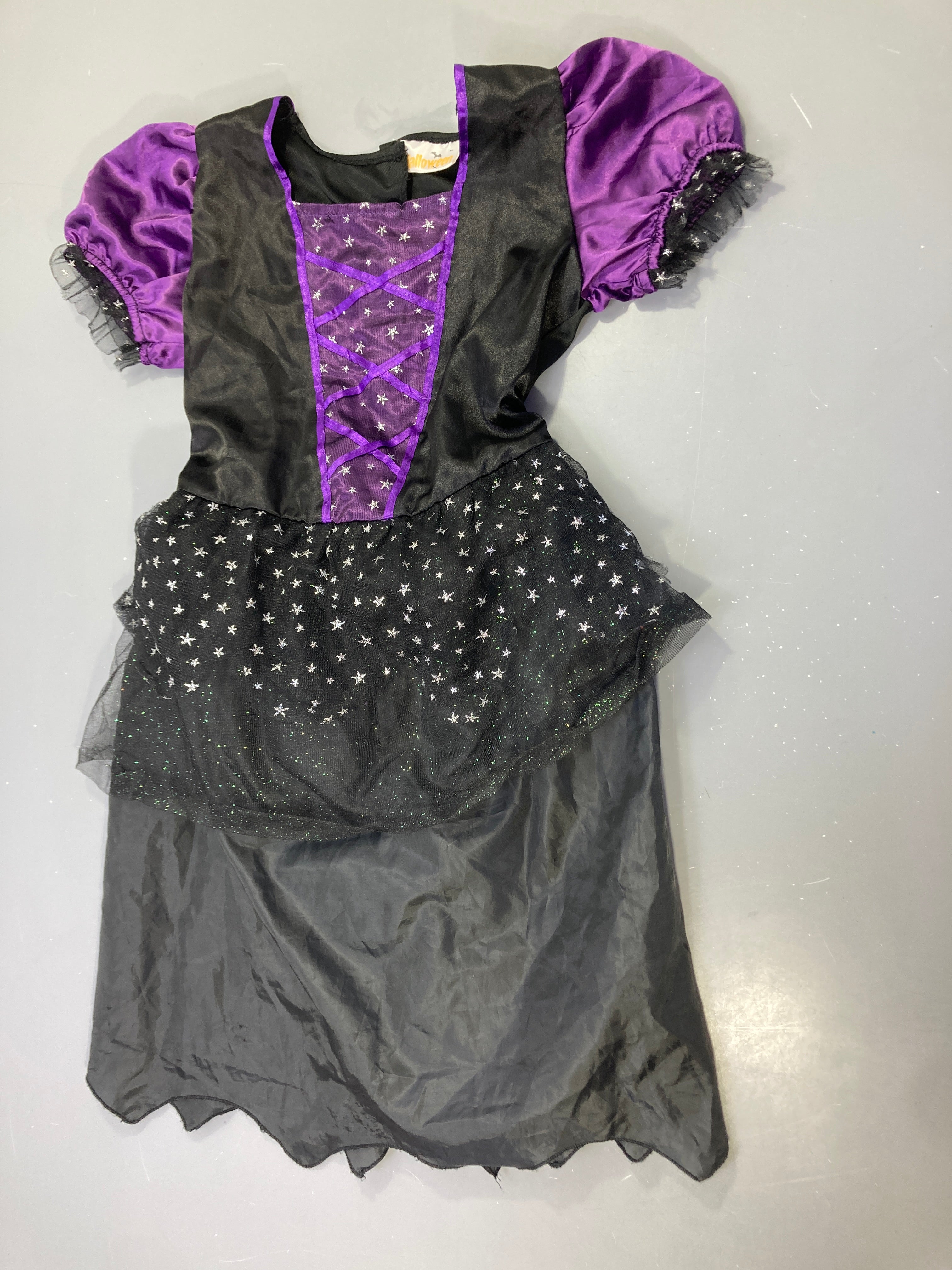 Déguisement Halloween robe sorcière noir/mauve étoiles