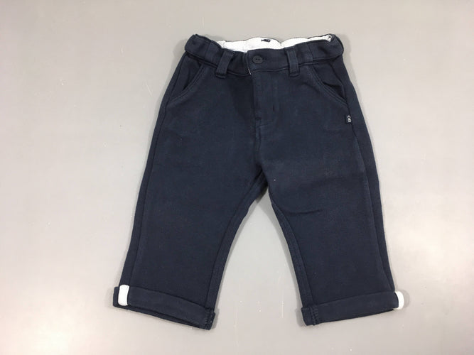 Pantalon texturé bleu marine à revers, un peu bouloché, moins cher chez Petit Kiwi