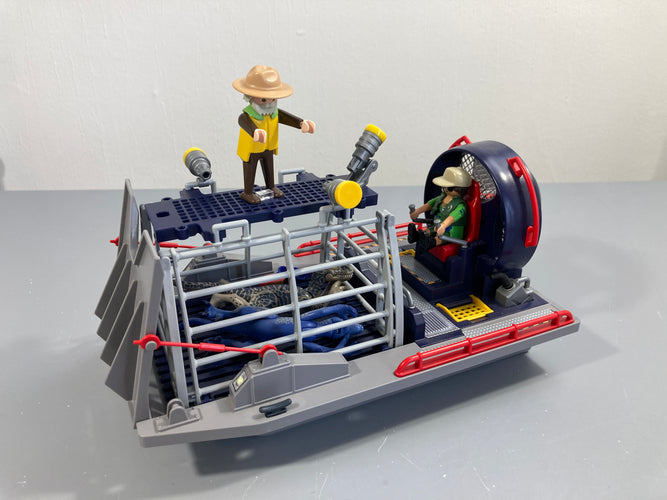 Playmobil 9433 The Explorers : Bateau avec cage et Déinonychu Vendu tel que sur la photo (manque la corde et crochet), moins cher chez Petit Kiwi