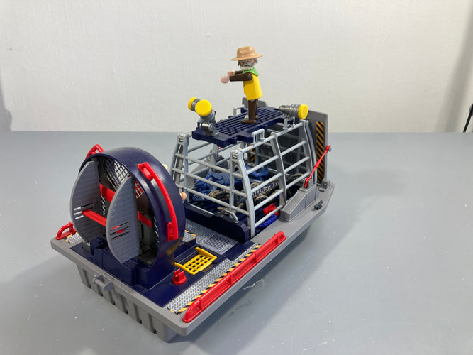 Playmobil 9433 The Explorers : Bateau avec cage et Déinonychu Vendu tel que sur la photo (manque la corde et crochet), moins cher chez Petit Kiwi