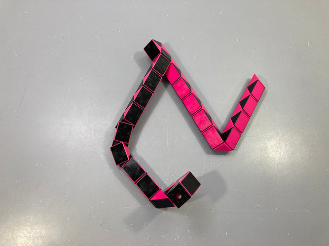 Serpent magique noir rose, moins cher chez Petit Kiwi