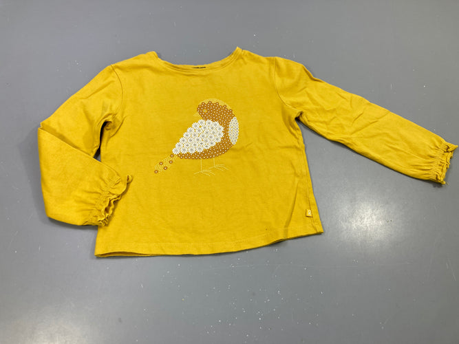 T-shirt m.l jaune , motif oiseau. Poignets élastiqués. Petite tache à l'arrière, moins cher chez Petit Kiwi