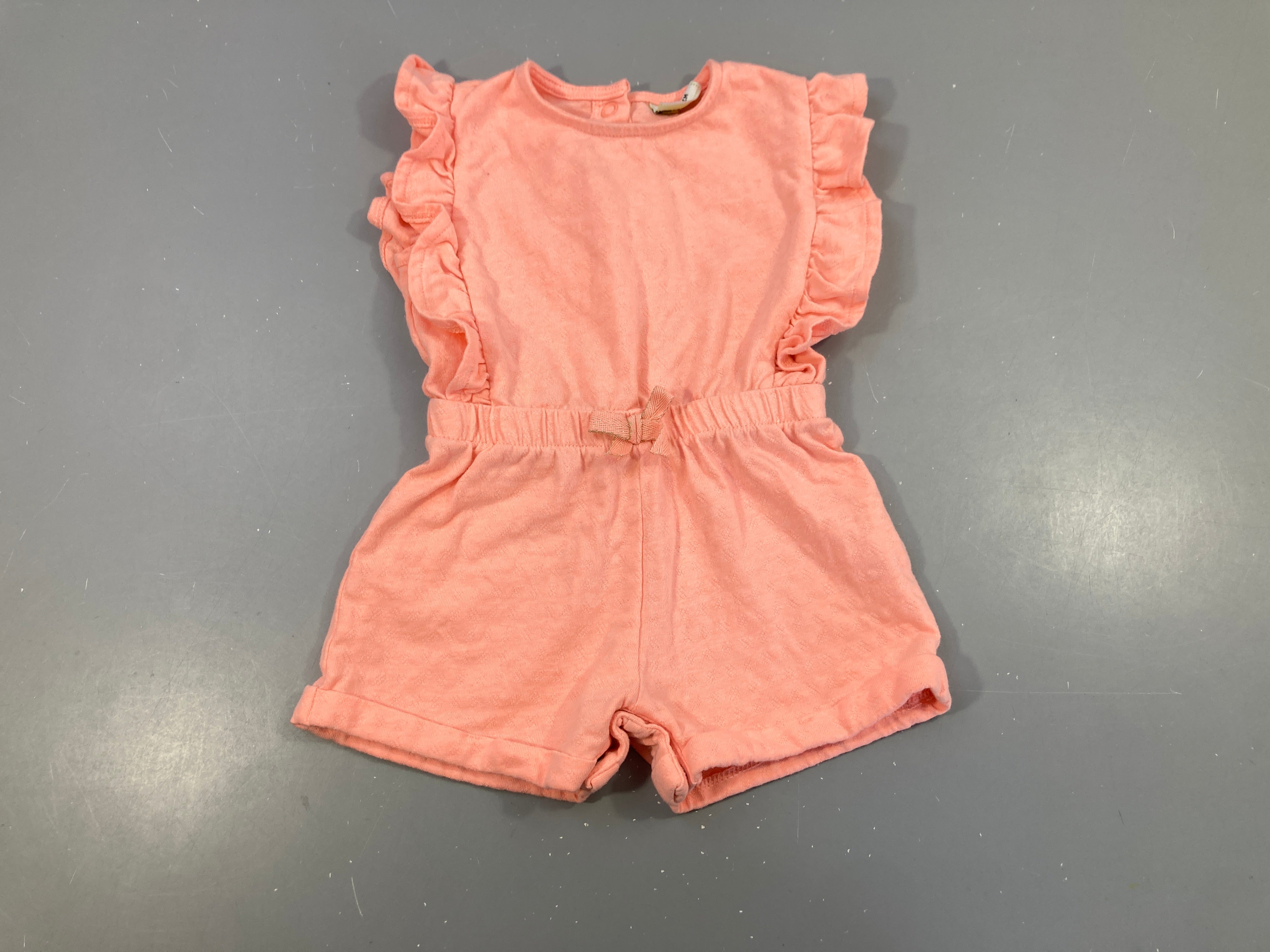 Combishort jersey m.c corail froufrous, légèrement bouloché