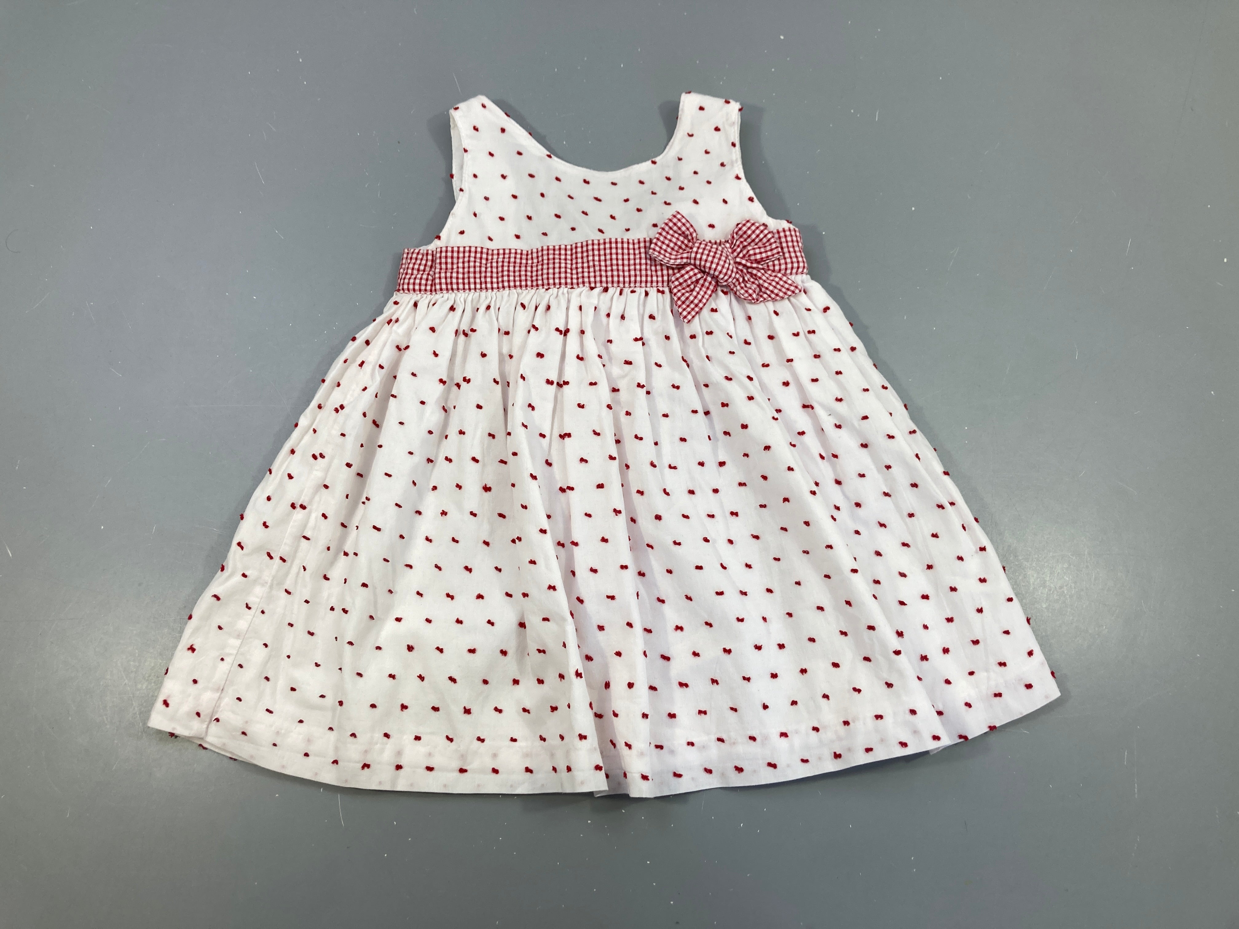 Robe s.m blanche plumetis rouge noeud