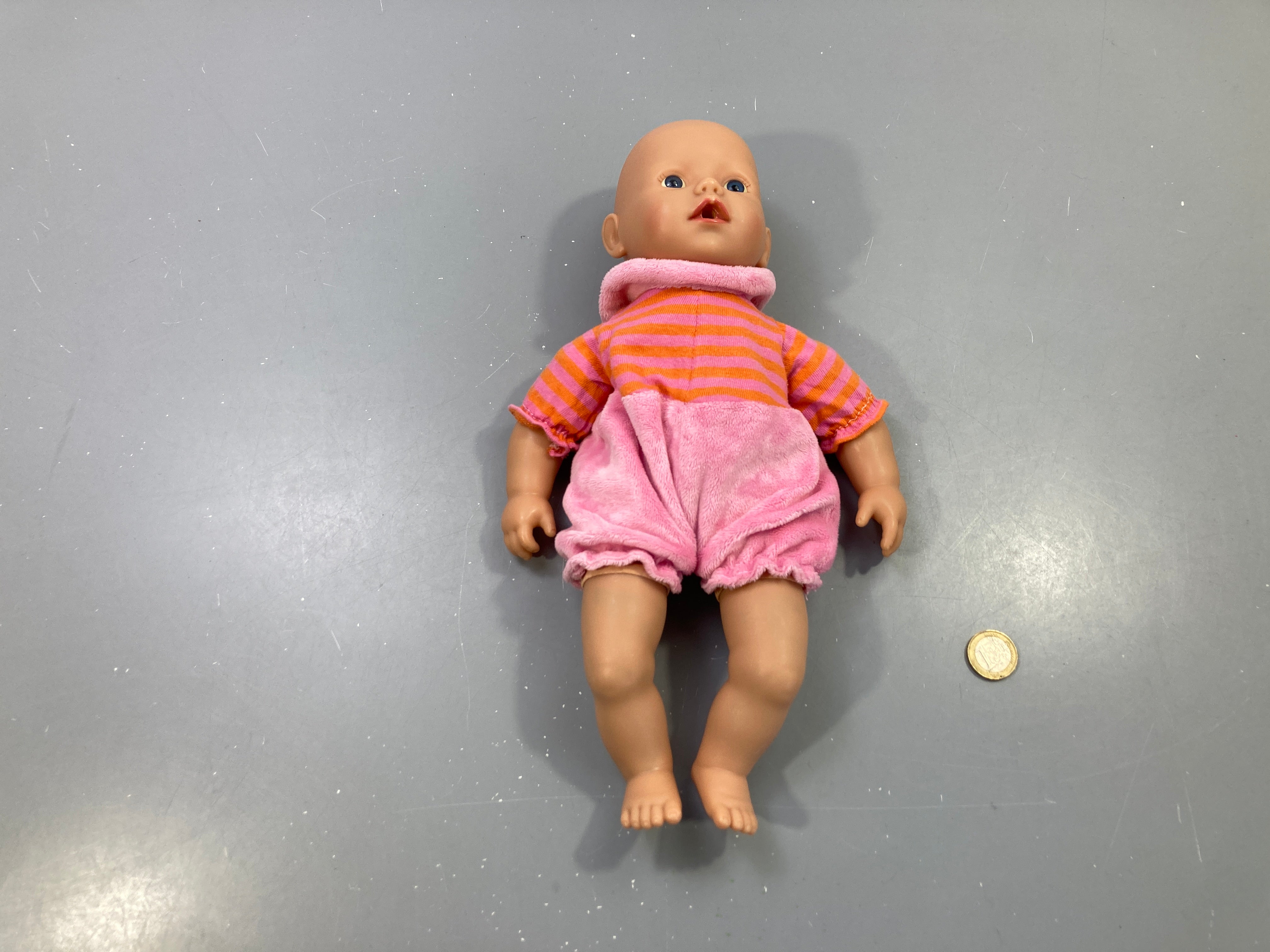 Poupon tenue rose et orange rayée