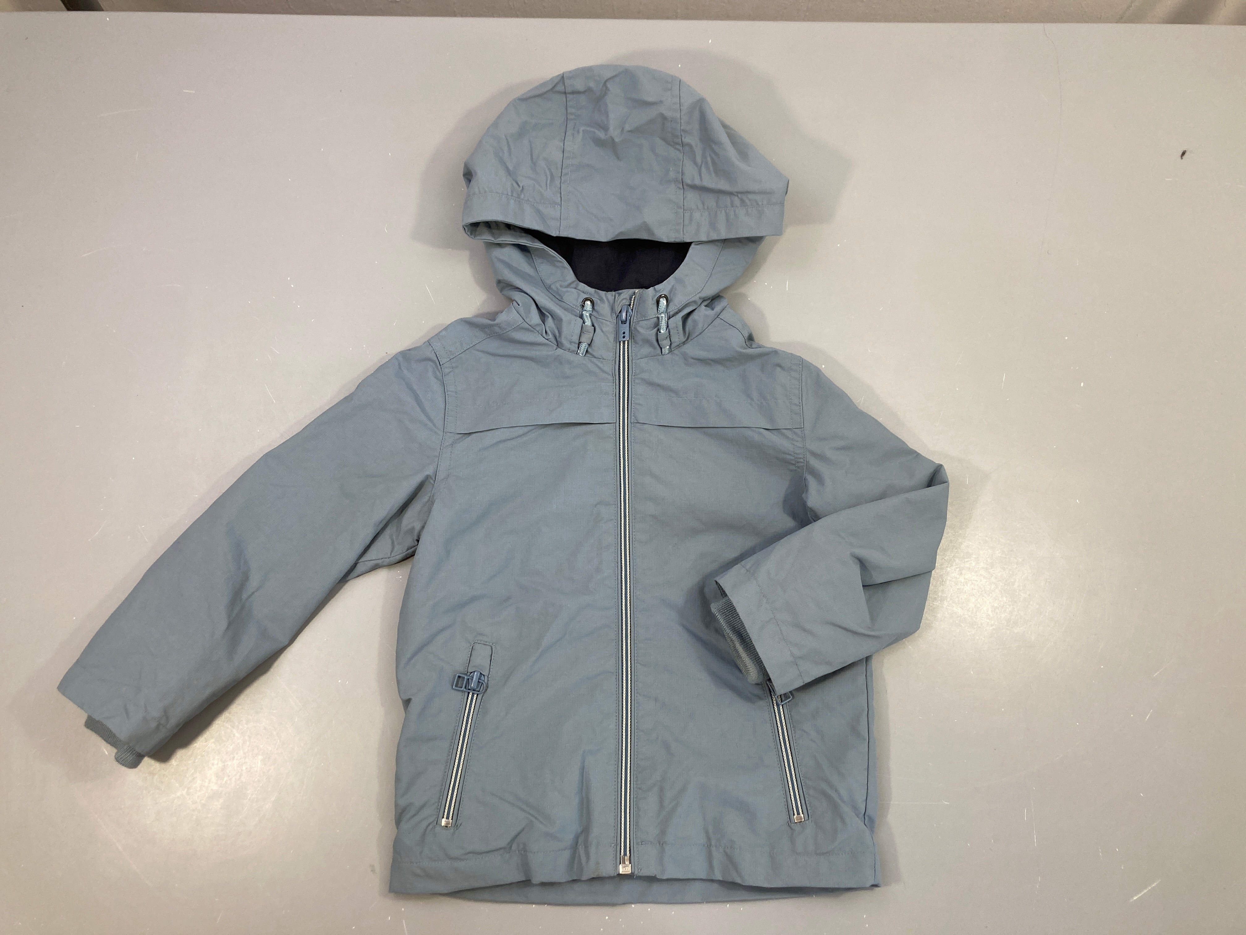Veste coupe-vent bleu grisé doublé jersey à capuche