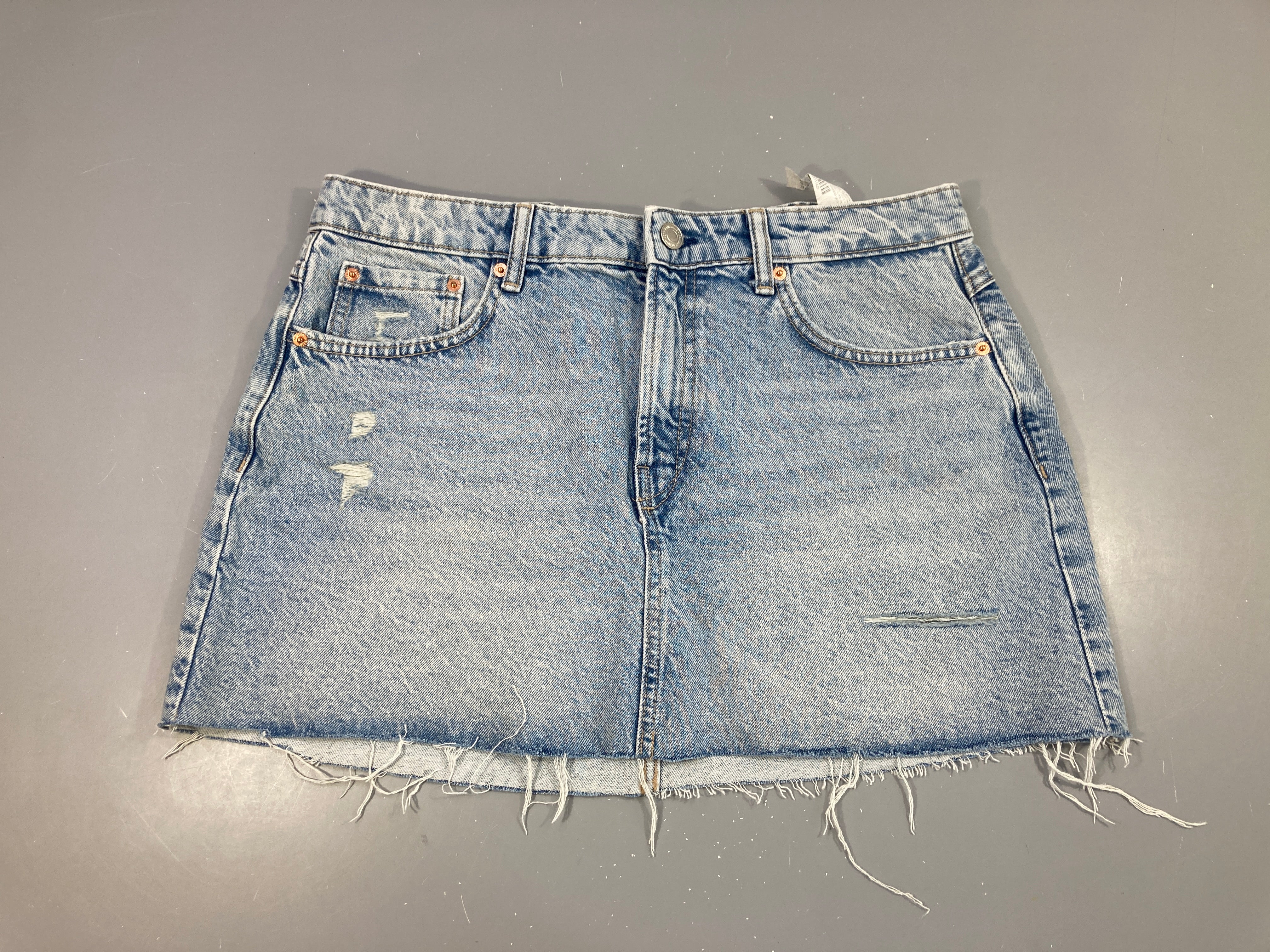 Jupe en jean éraillé effet effiloché 42 Stradivarius