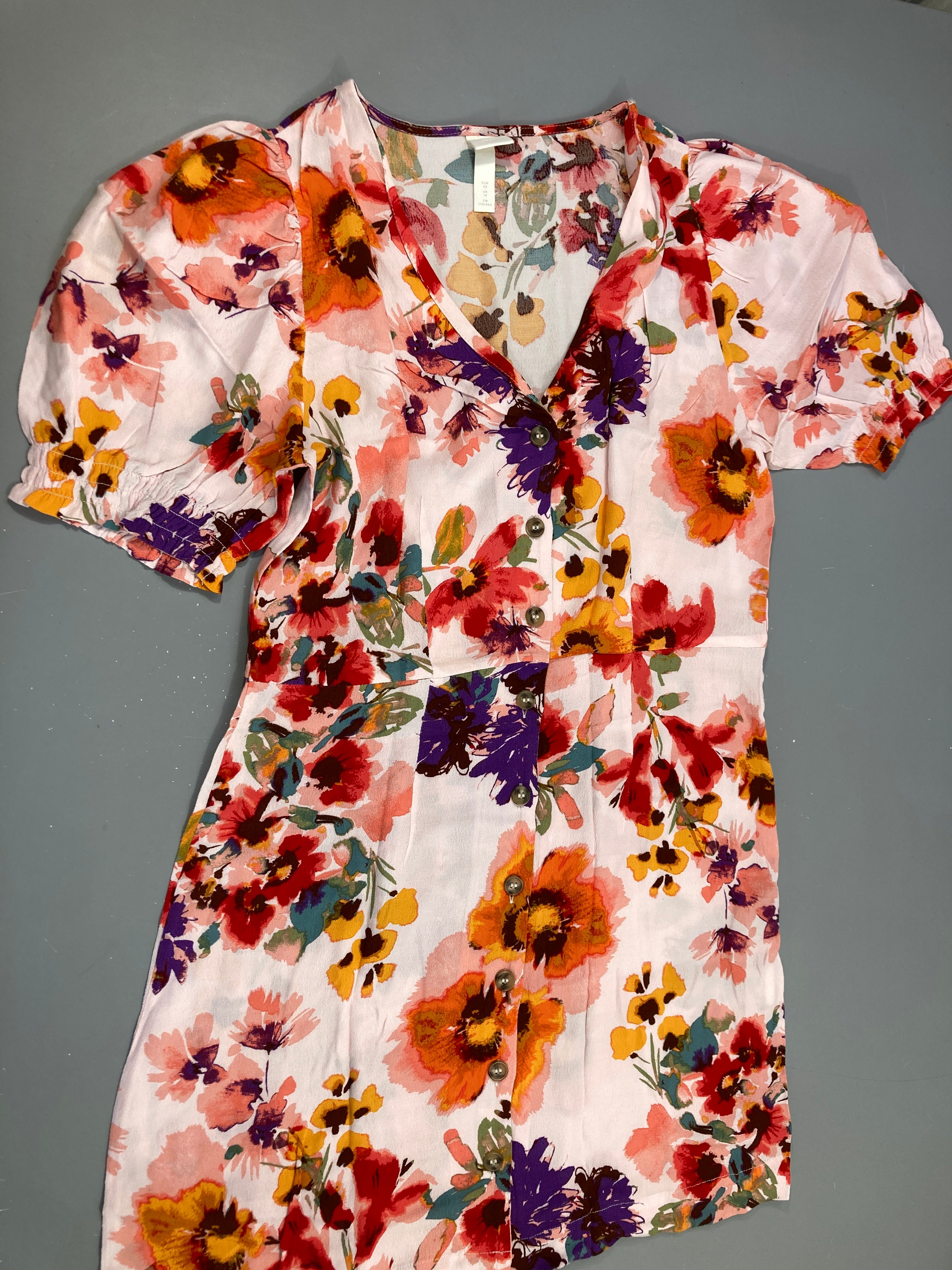 Robe m.c texturée écru fleurie orangée 42