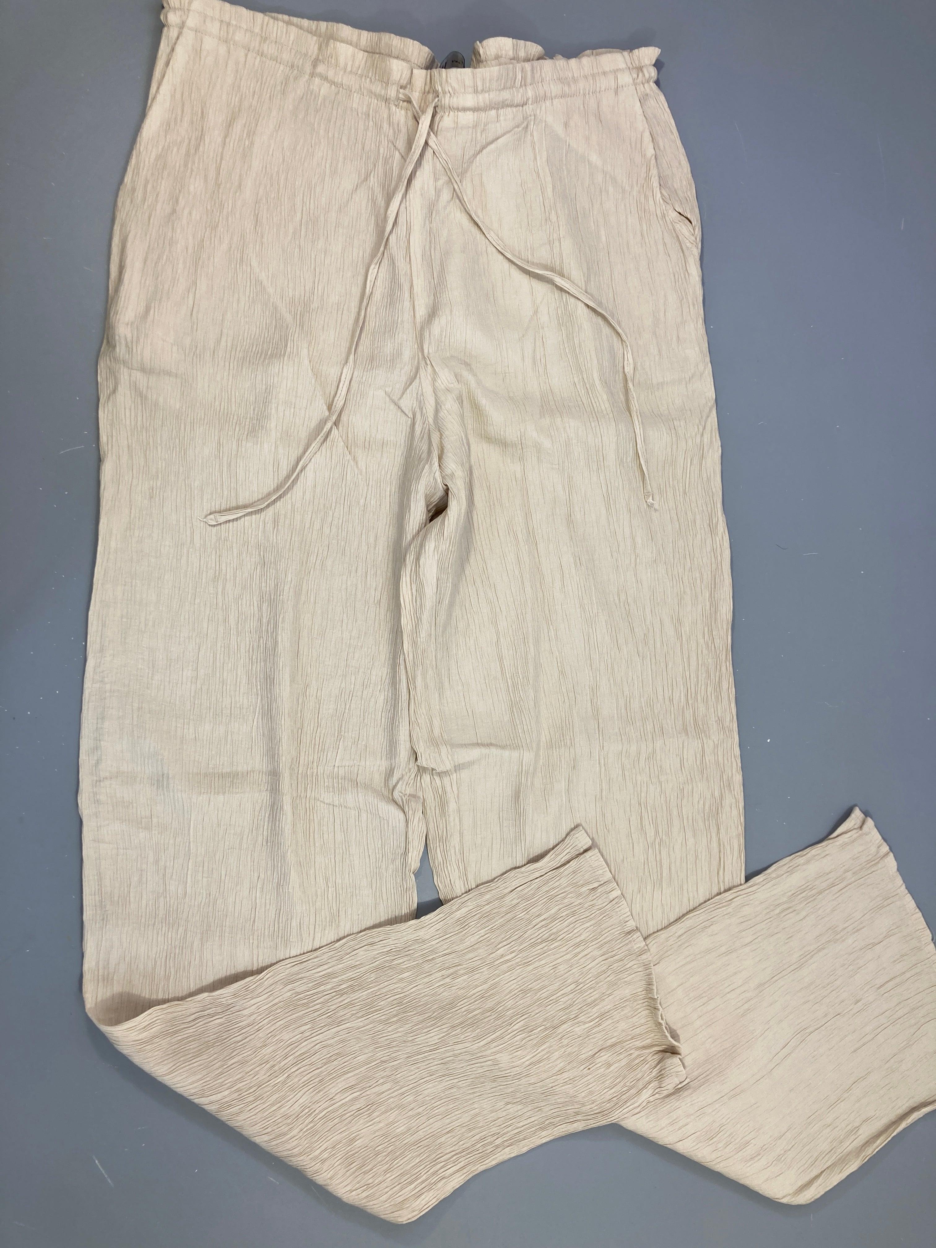 Pantalon fluide beige texturé