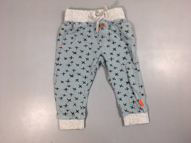 Pantalon jersey bleu motifs x taille et chevilles élastiques, moins cher chez Petit Kiwi