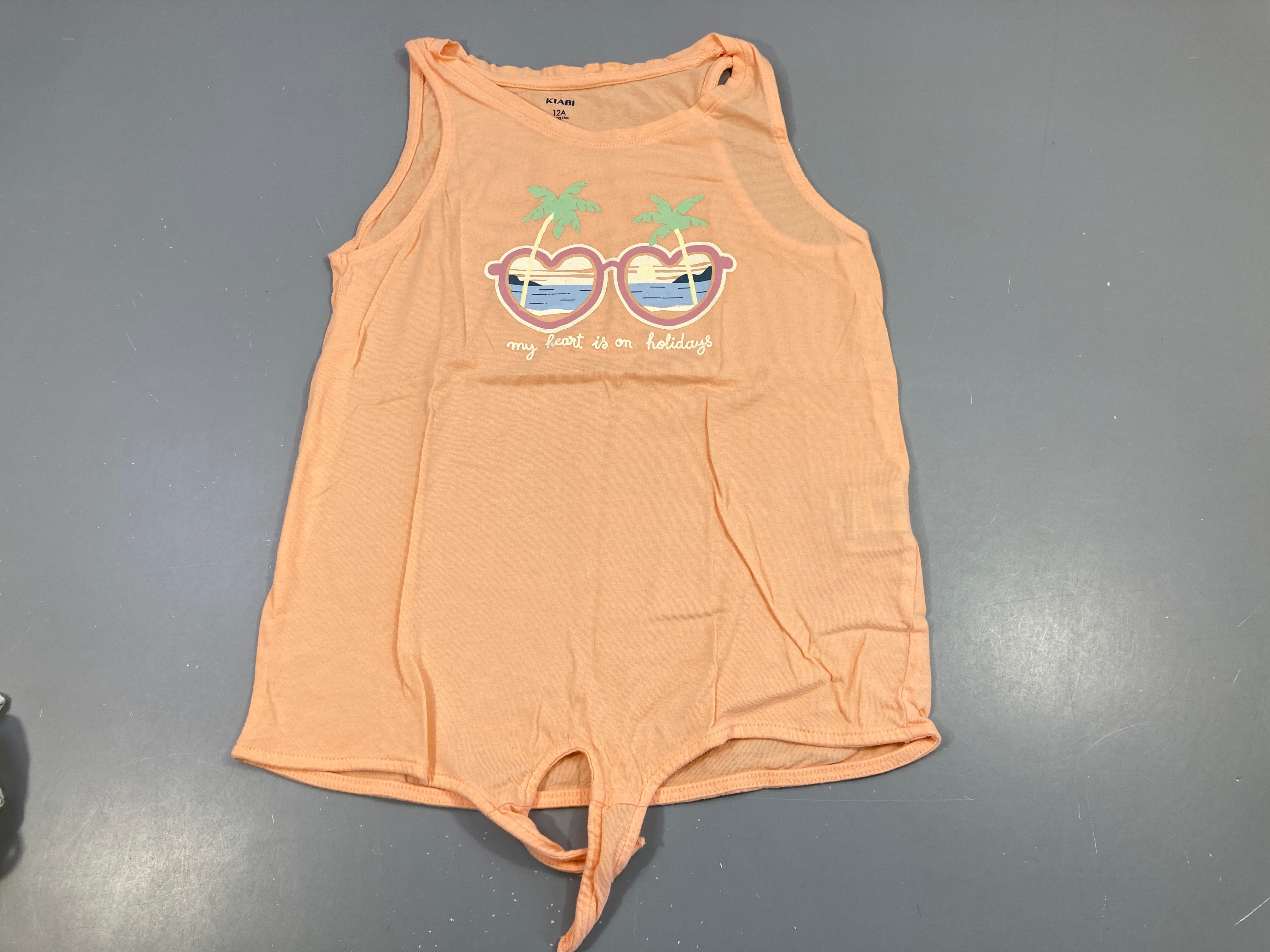 Débardeur oange néon lunettes