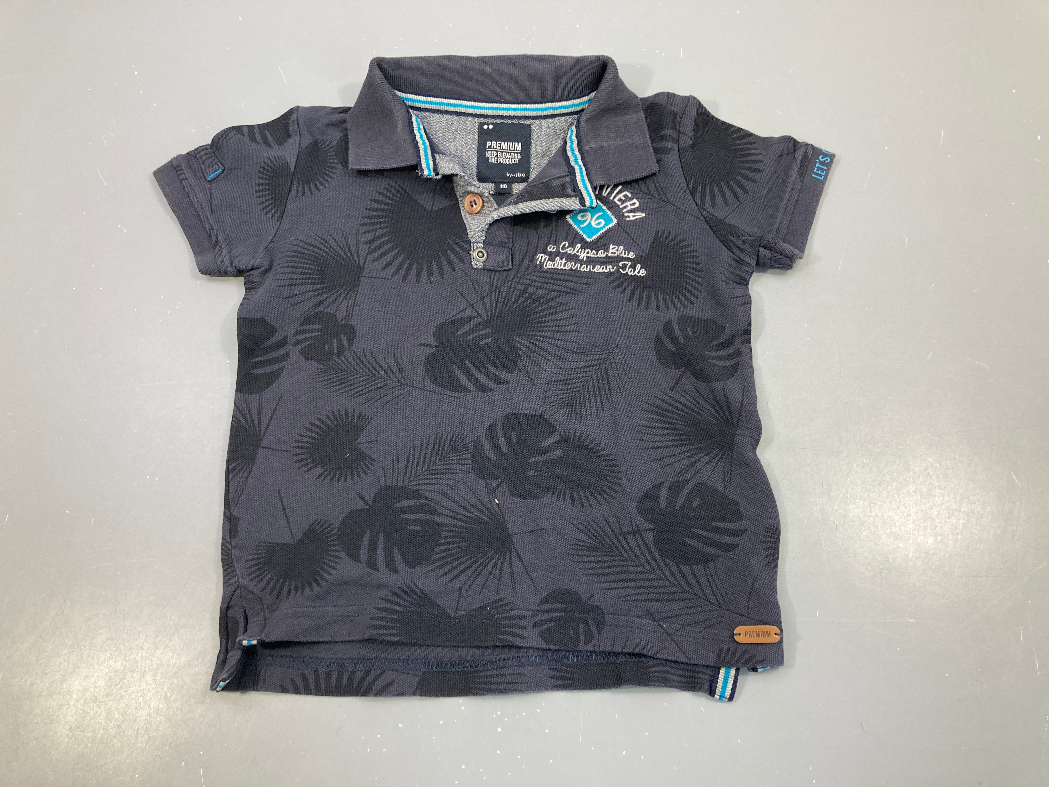 Polo m.c bleu marine feuilles