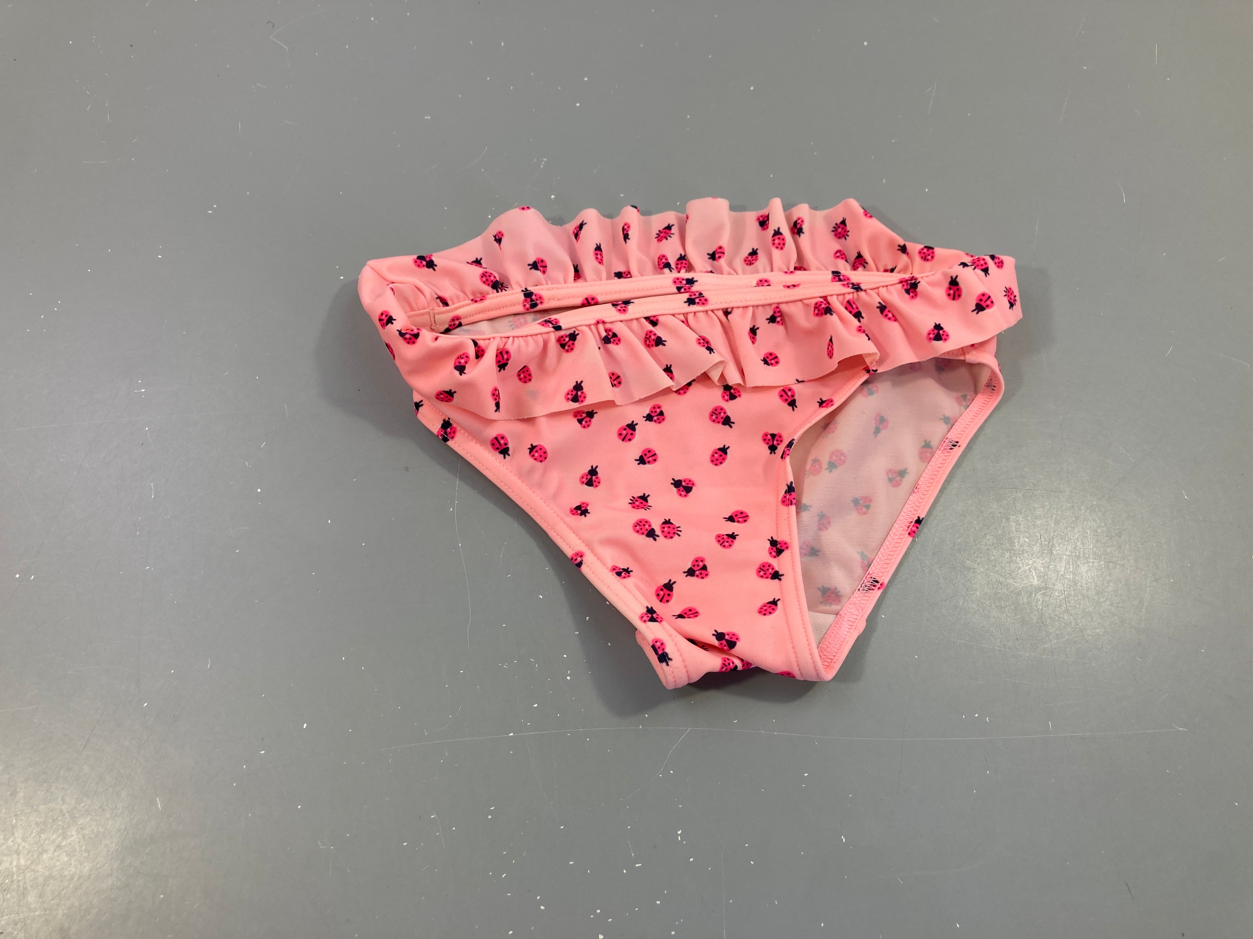 Culotte de maillot rose coccinelles