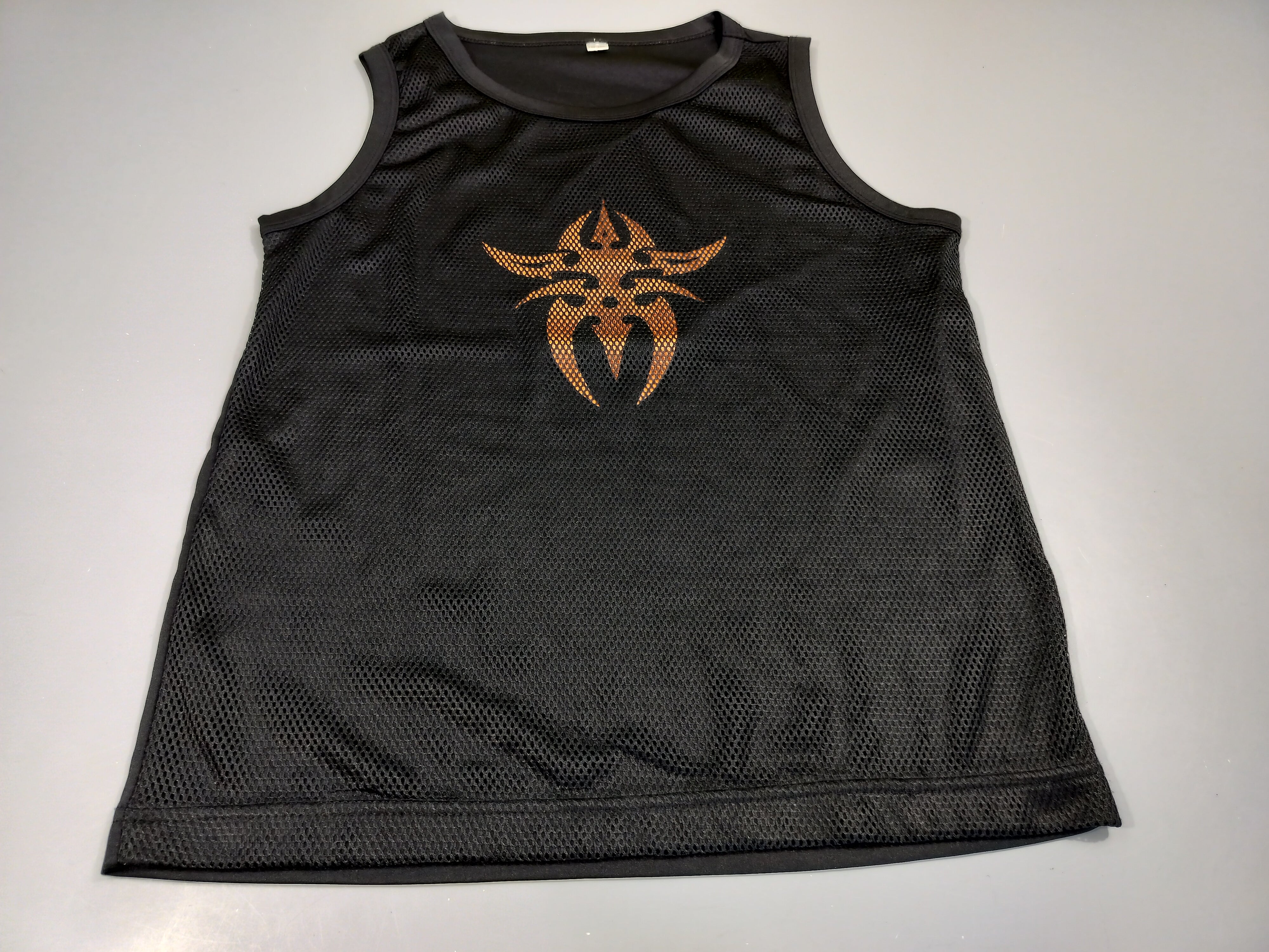 Débardeur de sport noir, motif Tribal orange